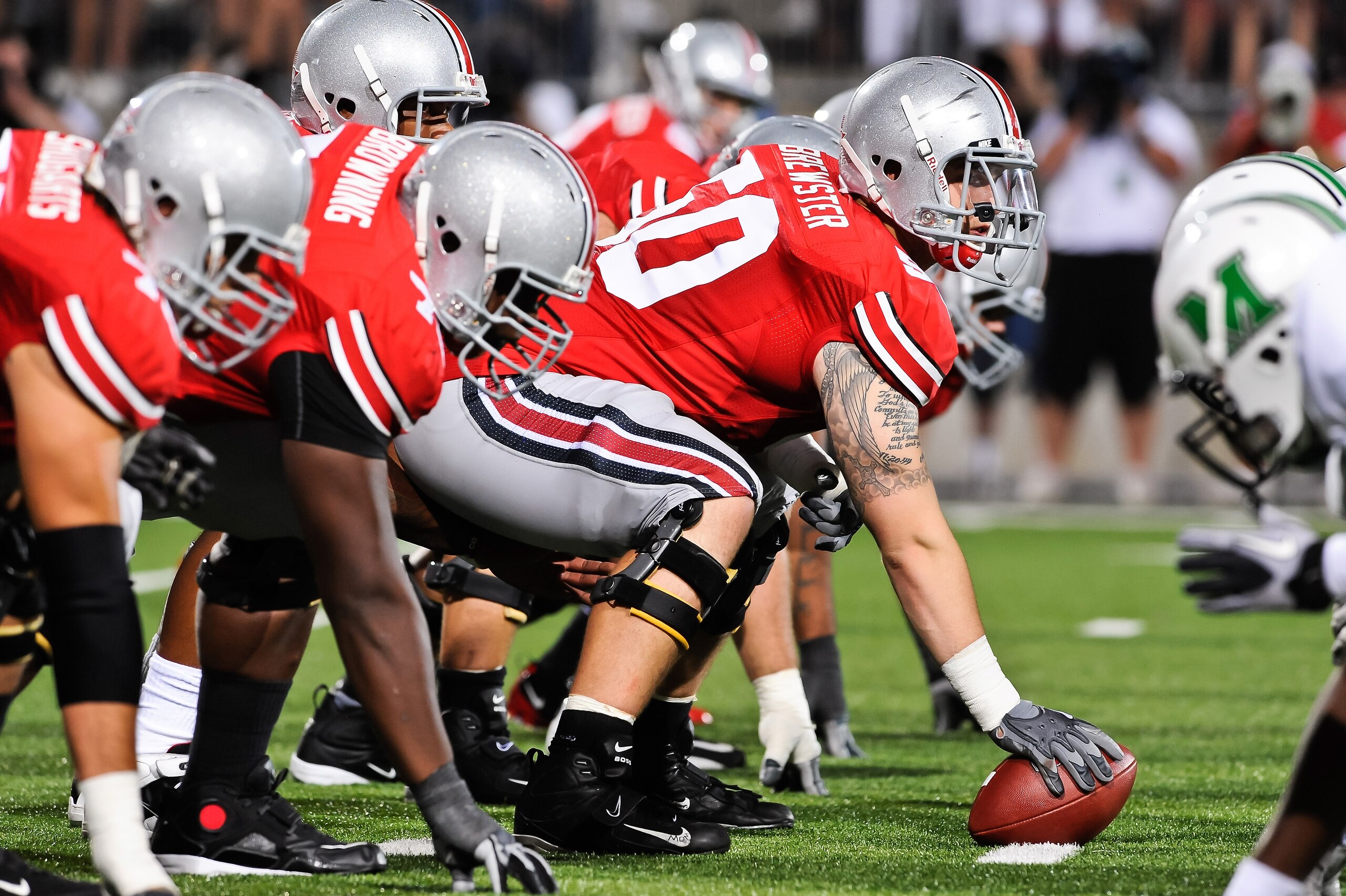 COLUMBUS, OH - SEPTEMBER 2: Michael Brewster #50 of the Ohio State Buckeyes gets ready to snap the ball against the Marshall Thundering Herd at Ohio Stadium on September 2, 2010 in Columbus, Ohio. (Photo by Jamie Sabau/Getty Images)
