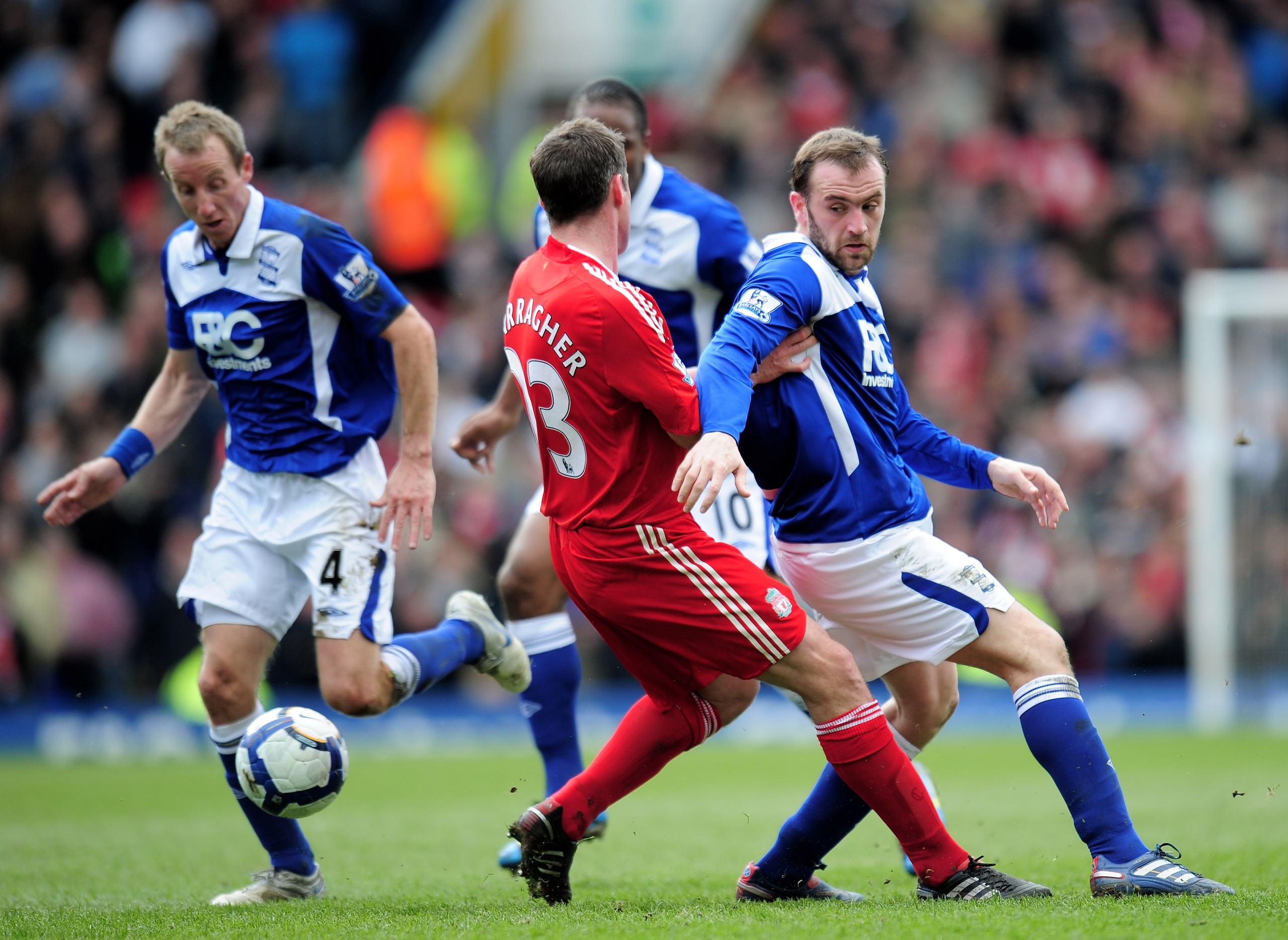 BIRMINGHAM, ENGLAND - APRIL 04: James McFadden of Birmingham City is challenged by Jamie Carragher of Liverpool during the Barclays Premier League match between Birmingham City and Liverpool at St. Andrews Stadium on April 4, 2010 in Birmingham, England. BIRMINGHAM, ENGLAND - APRIL 04: James McFadden of Birmingham City is challenged by Jamie Carragher of Liverpool during the Barclays Premier League match between Birmingham City and Liverpool at St. Andrews Stadium on April 4, 2010 in Birmingham, England.