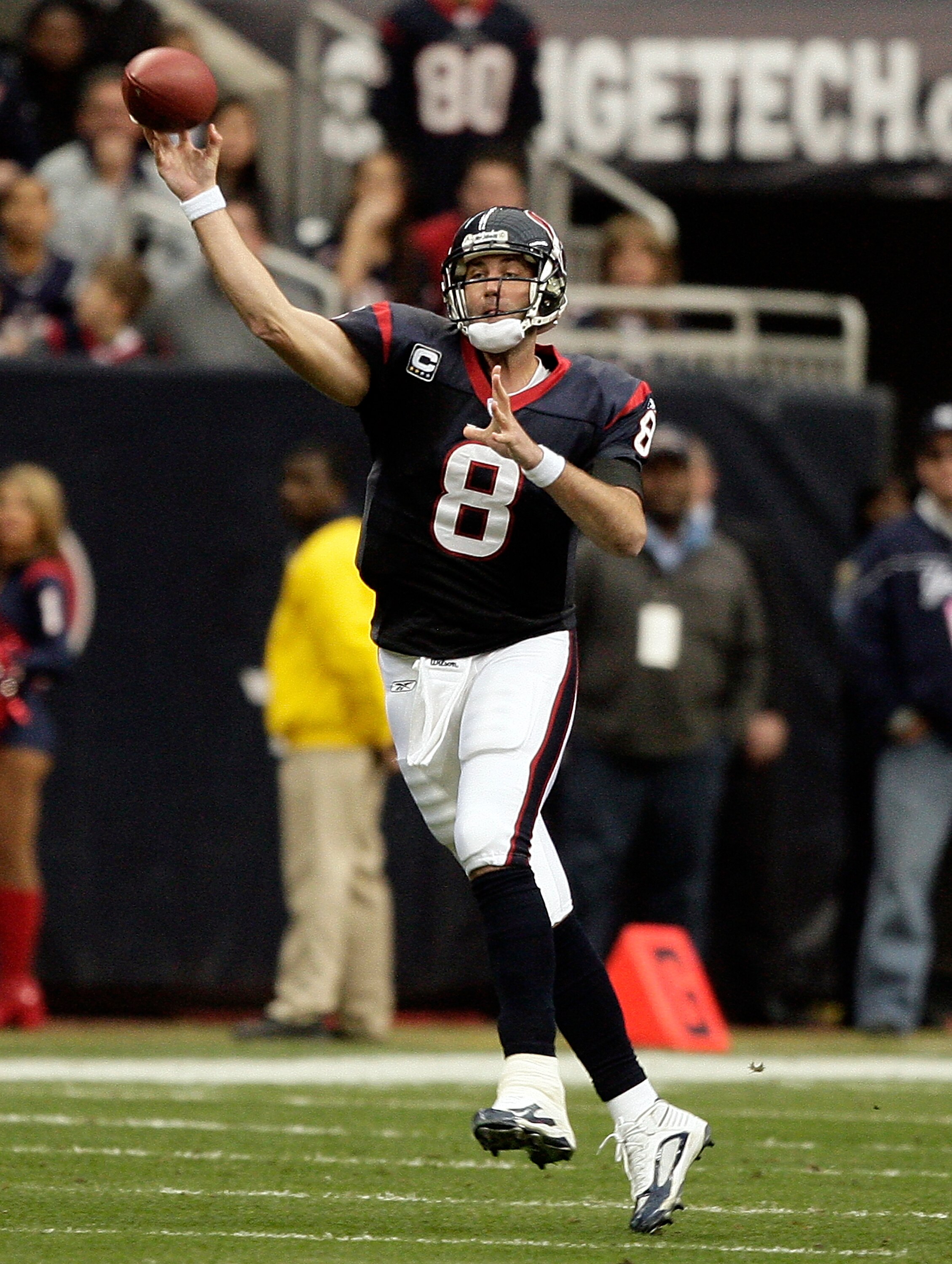 HOUSTON - JANUARY 03:  Quarterback Matt Schaub #8 of the Houston Texans throws on the run against the New England Patriots at Reliant Stadium on January 3, 2010 in Houston, Texas.  Houston won 34-27.(Photo by Bob Levey/Getty Images)