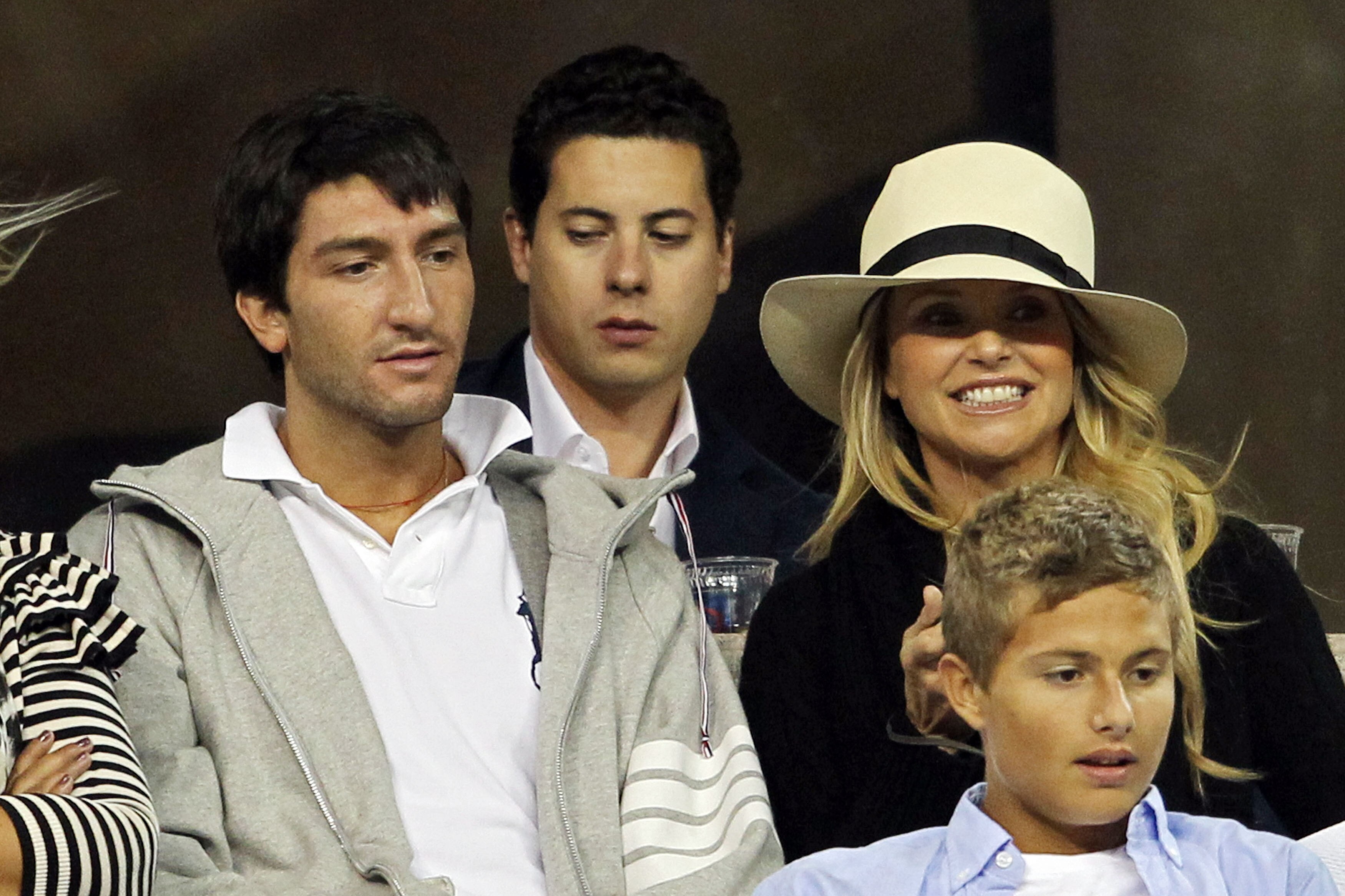 NEW YORK - SEPTEMBER 09:  Evan Lysacek and Christie Brinkley looks on as Rafael Nadal of Spain plays against Fernando Verdasco of Spain during his men's single quarterfinal match on day eleven of the 2010 U.S. Open at the USTA Billie Jean King National Te