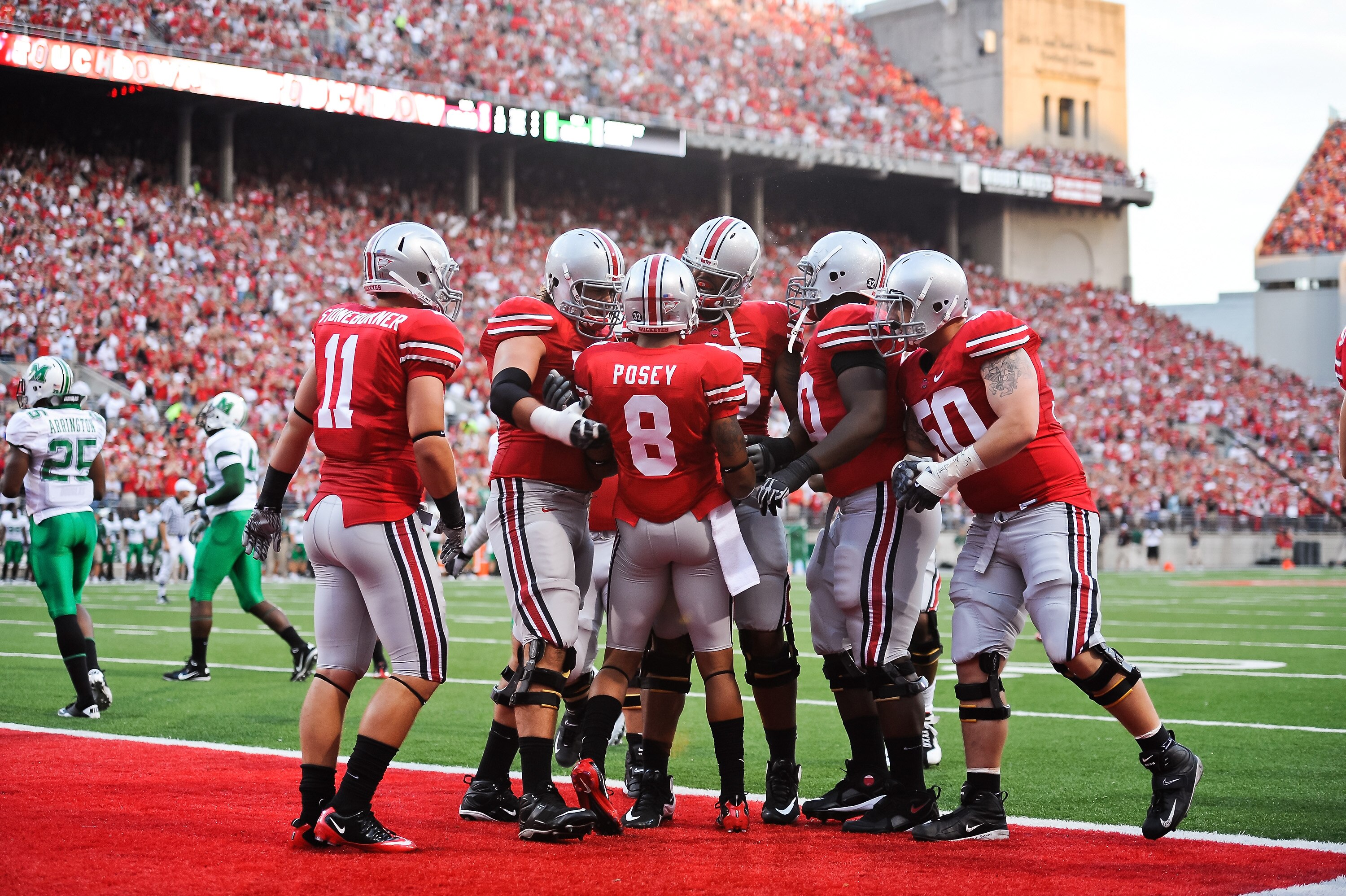 COLUMBUS, OH - SEPTEMBER 2: The Ohio State Buckeyes celebrate a touchdown by DeVier Posey #8 of the Ohio State Buckeyes against the Marshall Thundering Herd at Ohio Stadium on September 2, 2010 in Columbus, Ohio. (Photo by Jamie Sabau/Getty Images)
