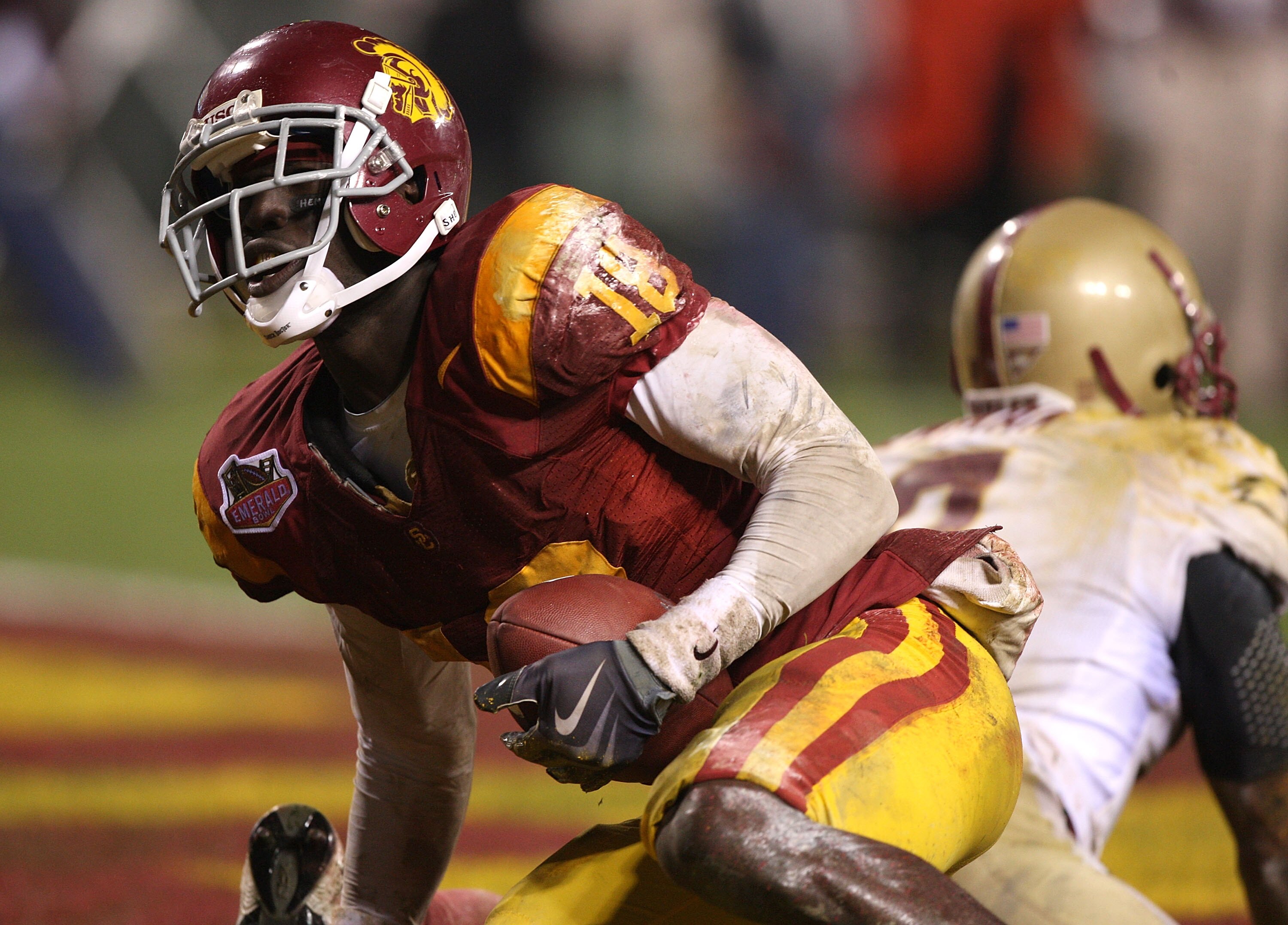 SAN FRANCISCO - DECEMBER 26: Damian Williams #18 of the USC Trojans scores a touchdown against the Boston College Eagles during the 2009 Emerald Bowl at AT&T Park on December 26, 2009 in San Francisco, California. (Photo by Jed Jacobsohn/Getty Images)