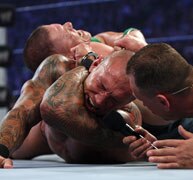 Bragging Rights match. To Orton with handcuffs! OUCH!