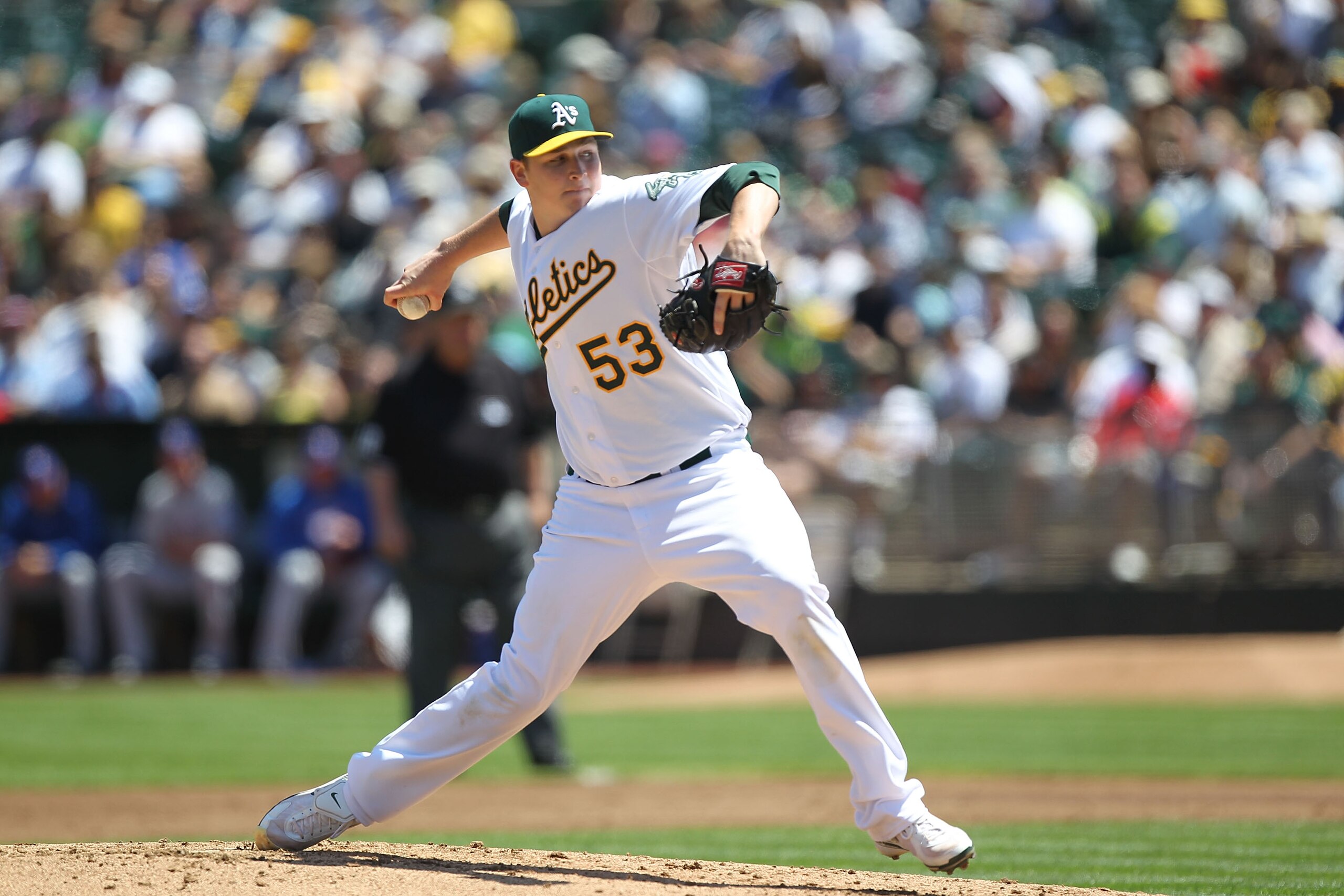 OAKLAND, CA - AUGUST 08:  Trevor Cahill #53 of the Oakland Athletics pitches against the Texas Rangers during an MLB game at the Oakland-Alameda County Coliseum on August 8, 2010 in Oakland, California.  (Photo by Jed Jacobsohn/Getty Images)