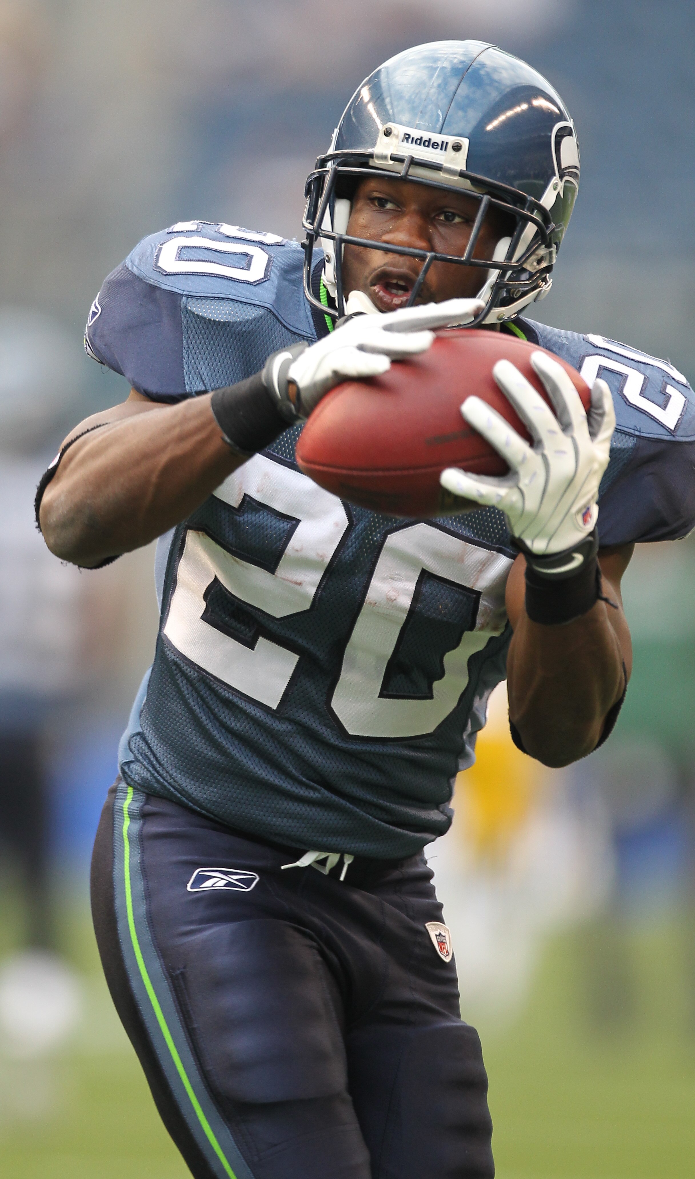 SEATTLE - AUGUST 21:  Running back Justin Forsett #20 of the Seattle Seahawks makes a catch during warmups prior to the preseason game against the Green Bay Packers at Qwest Field on August 21, 2010 in Seattle, Washington. (Photo by Otto Greule Jr/Getty I