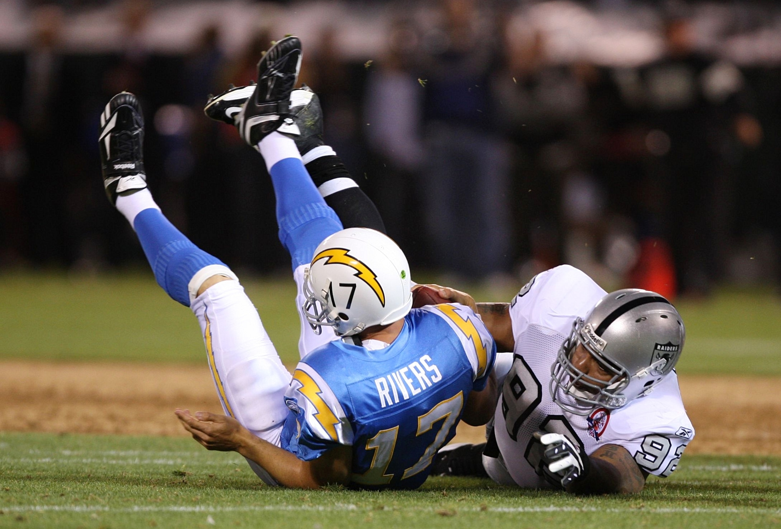 OAKLAND, CA - SEPTEMBER 14:  Richard Seymour #92 of the Oakland Raiders sacks Philip Rivers #17 of the San Diego Chargers on September 14, 2009 at the Oakland-Alameda County Coliseum in Oakland, California.  (Photo by Ezra Shaw/Getty Images)