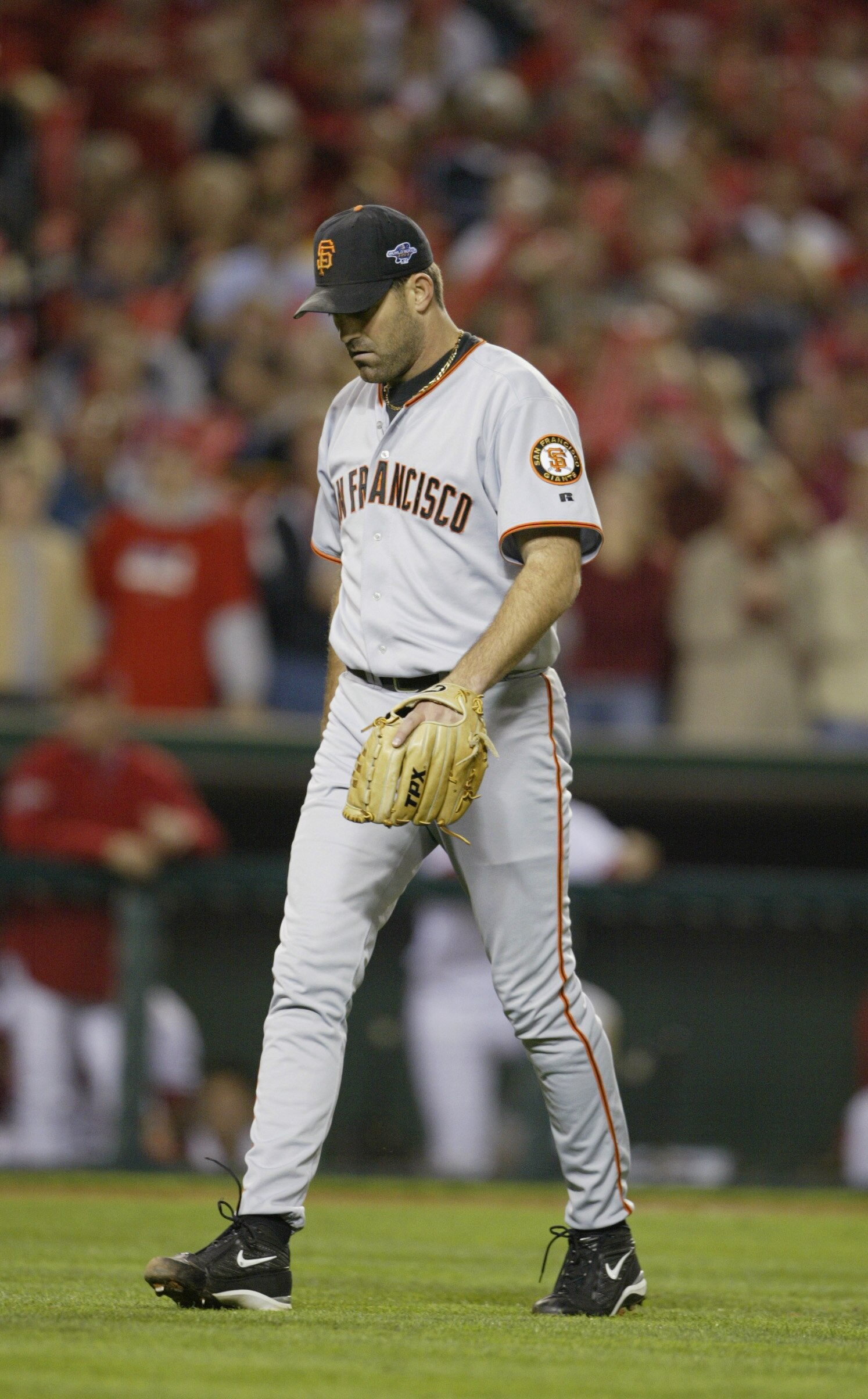 ANAHEIM, CA - OCTOBER 26:  Pitcher Robb Nen #31 of the San Francisco Giants walks back to the dugout after giving up an two run rbi double in the eighth inning against the Anaheim Angels during game six of the World Series on October 26, 2002 at Edison Fi
