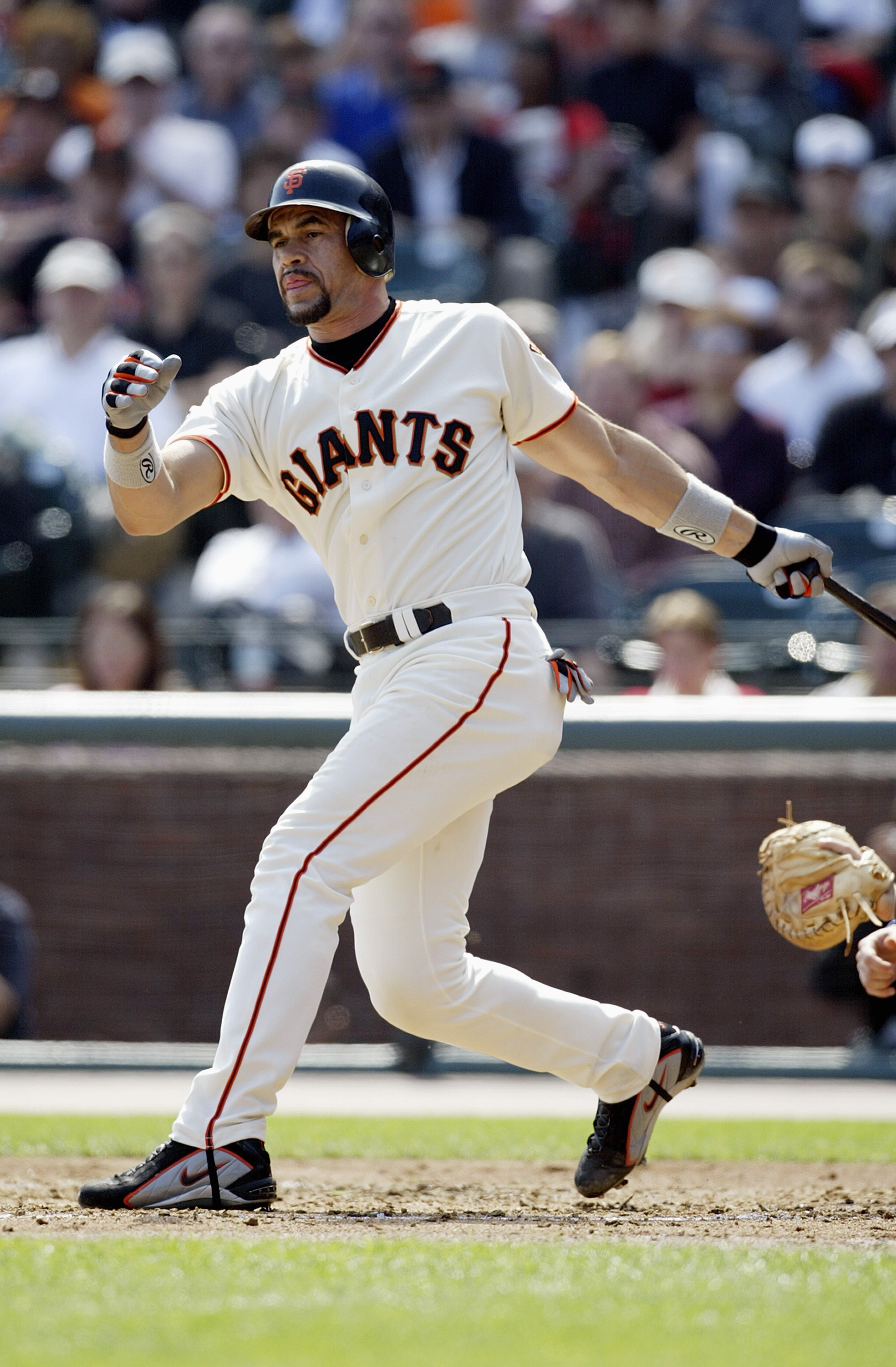 SAN FRANCISCO - SEPTEMBER 27:  Catcher Benito Santiago #33 of the San Francisco Giants swings against the Los Angeles Dodgers during a game at Pac Bell Park on September 27, 2003 in San Francisco, California. The Giants defeated the Dodgers 6-3. (Photo by