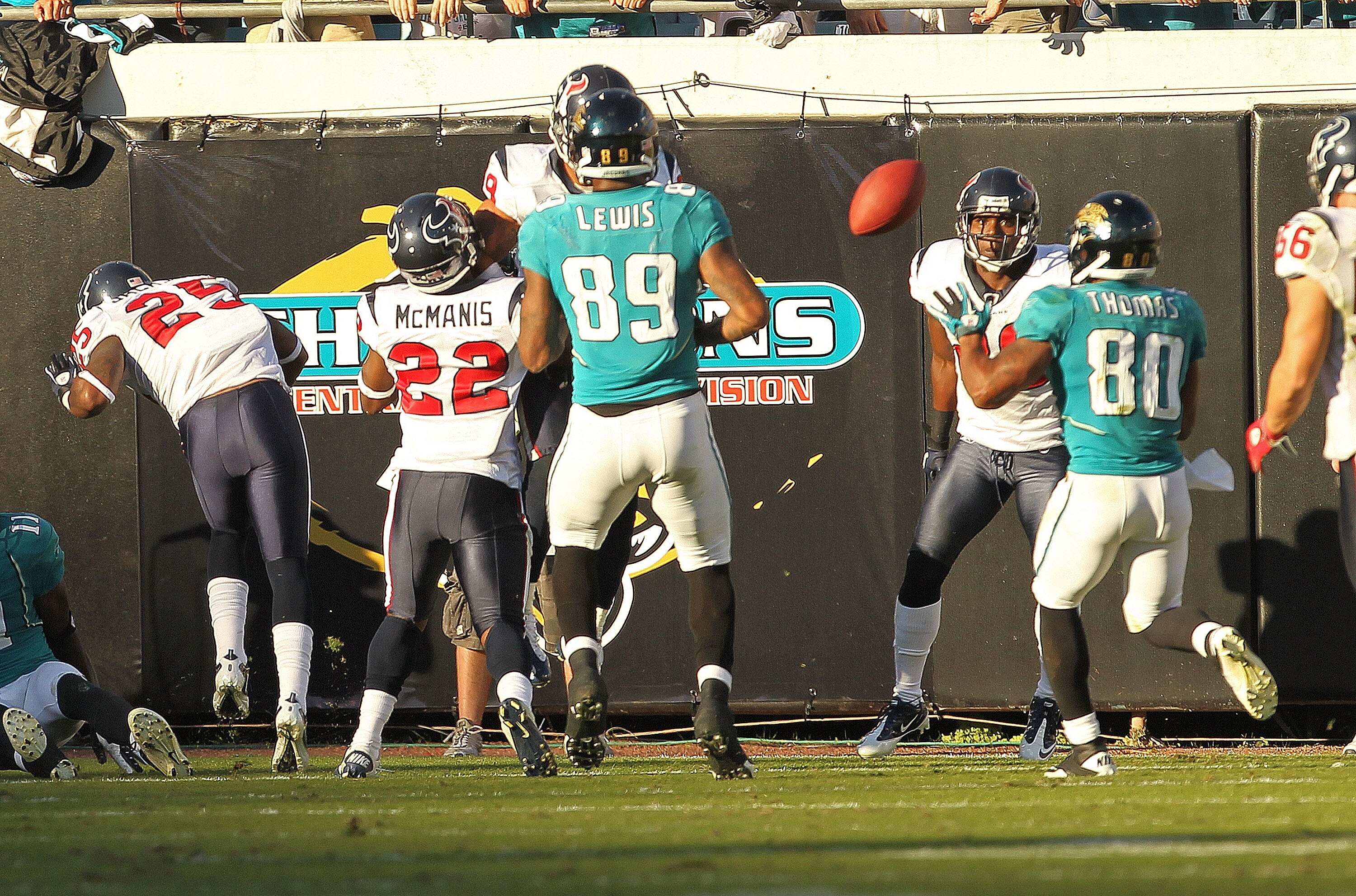 JACKSONVILLE, FL - NOVEMBER 14:  Mike Thomas #80 of the Jacksonville Jaguars catches a tipped pass winning a game against the Houston Texans at EverBank Field on November 14, 2010 in Jacksonville, Florida.  (Photo by Mike Ehrmann/Getty Images)