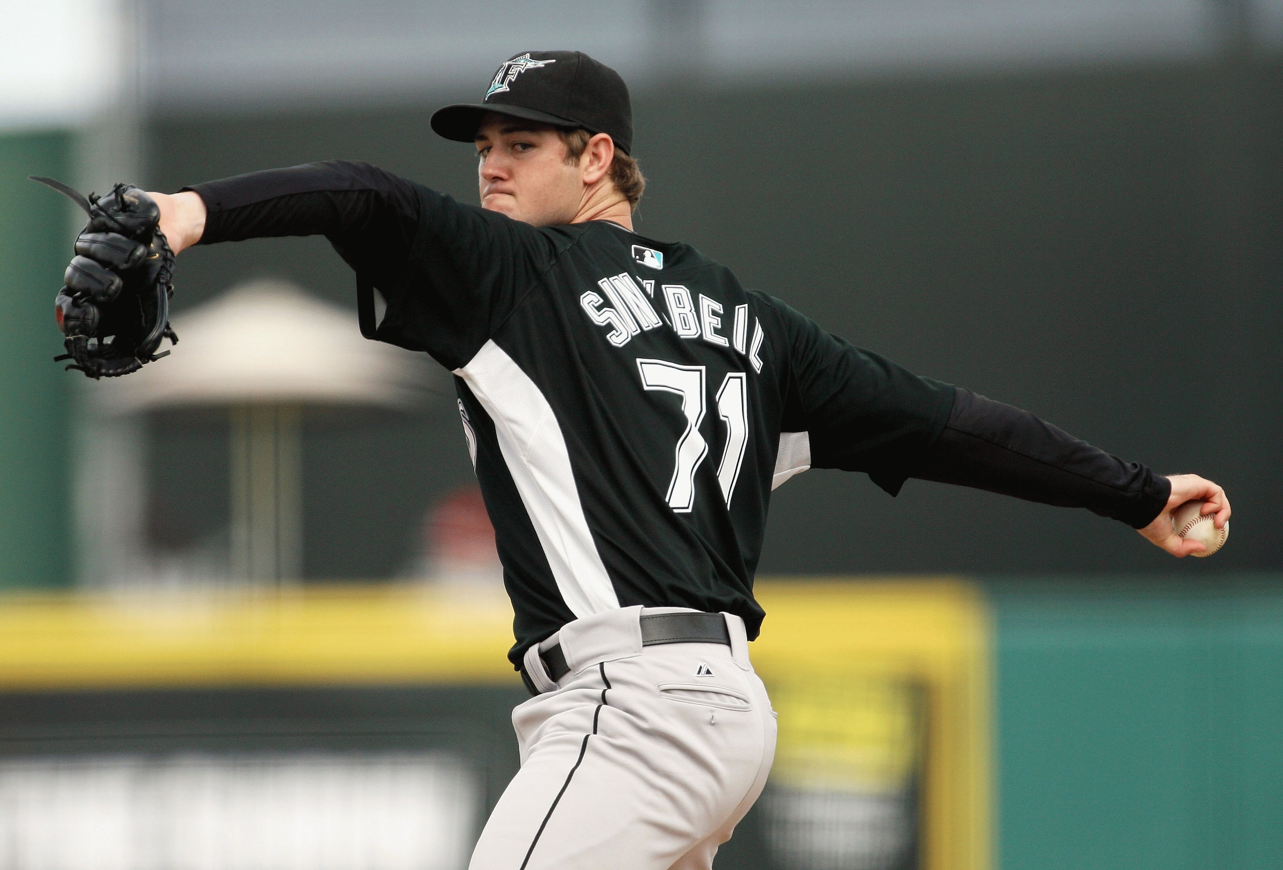 JUPITER, FL - FEBRUARY 25: Pitcher Brett Sinkbeil #71 of the Florida Marlins pitches against the St. Louis Cardinals during a spring training game at Roger Dean Stadium on February 25, 2009 in Jupiter, Florida. The Marlins and the Mets played to a 5-5 ti JUPITER, FL - FEBRUARY 25: Pitcher Brett Sinkbeil #71 of the Florida Marlins pitches against the St. Louis Cardinals during a spring training game at Roger Dean Stadium on February 25, 2009 in Jupiter, Florida. The Marlins and the Mets played to a 5-5 ti