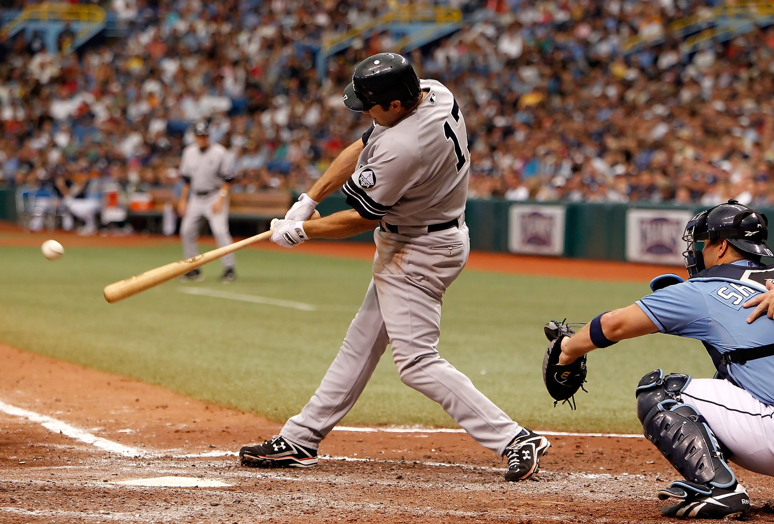 ST. PETERSBURG - AUGUST 01:  Infielder Lance Berkman #17 of the New York Yankees gets his first hit as a member of the Yankees against the Tampa Bay Rays during the game at Tropicana Field on August 1, 2010 in St. Petersburg, Florida. Tampa Bay beat the Y