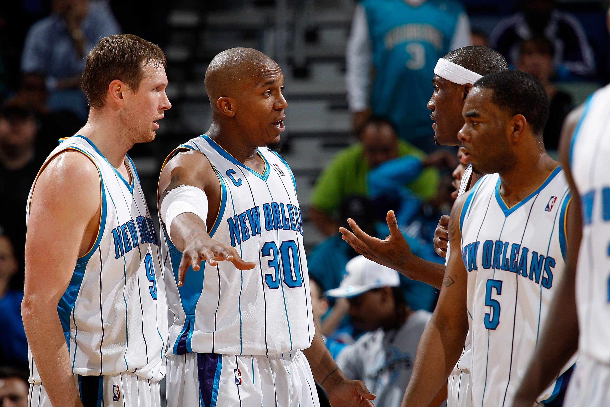 NEW ORLEANS - MARCH 08: Darius Songalia #9, David West #30, James Posey #41 and Marcus Thornton #5 of the New Orleans Hornets talk during a timeout against the Golden State Warriors at New Orleans Arena on March 8, 2010 in New Orleans, Louisiana. The Ho NEW ORLEANS - MARCH 08: Darius Songalia #9, David West #30, James Posey #41 and Marcus Thornton #5 of the New Orleans Hornets talk during a timeout against the Golden State Warriors at New Orleans Arena on March 8, 2010 in New Orleans, Louisiana. The Ho