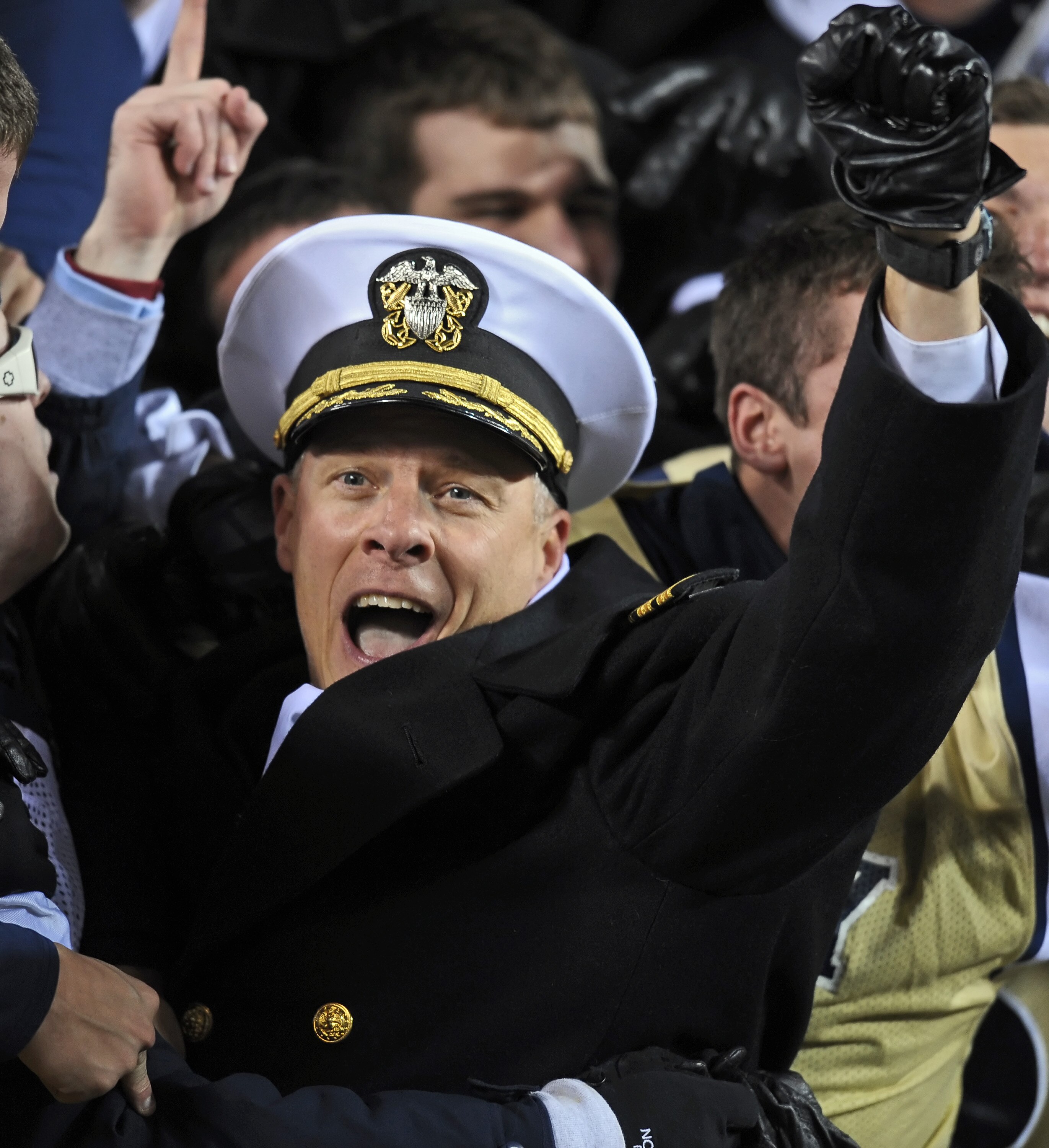 PHILADELPHIA - DECEMBER 12: Captain Matthew L. Klunder, Commandant of Midshipmen cheers during the game against the Army Black Knights on December 12, 2009 at Lincoln Financial Field in Philadelphia, Pennsylvania. Navy won 17-3. (Photo by Drew Hallowell/G