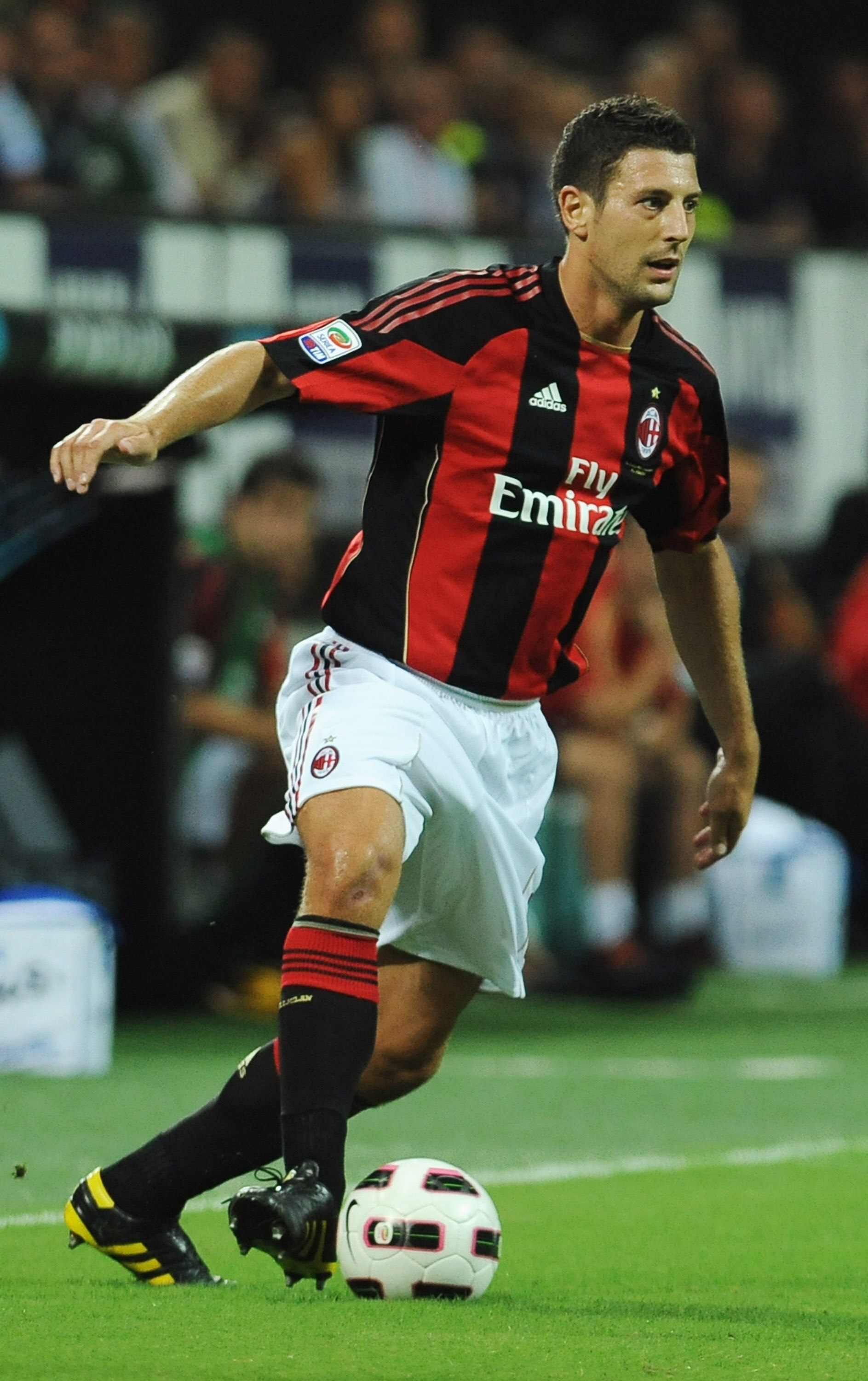 MILAN, ITALY - AUGUST 29:  Daniele Bonera of AC Milan in action during the Serie A match between AC Milan and US Lecce at Stadio Giuseppe Meazza on August 29, 2010 in Milan, Italy.  (Photo by Valerio Pennicino/Getty Images)