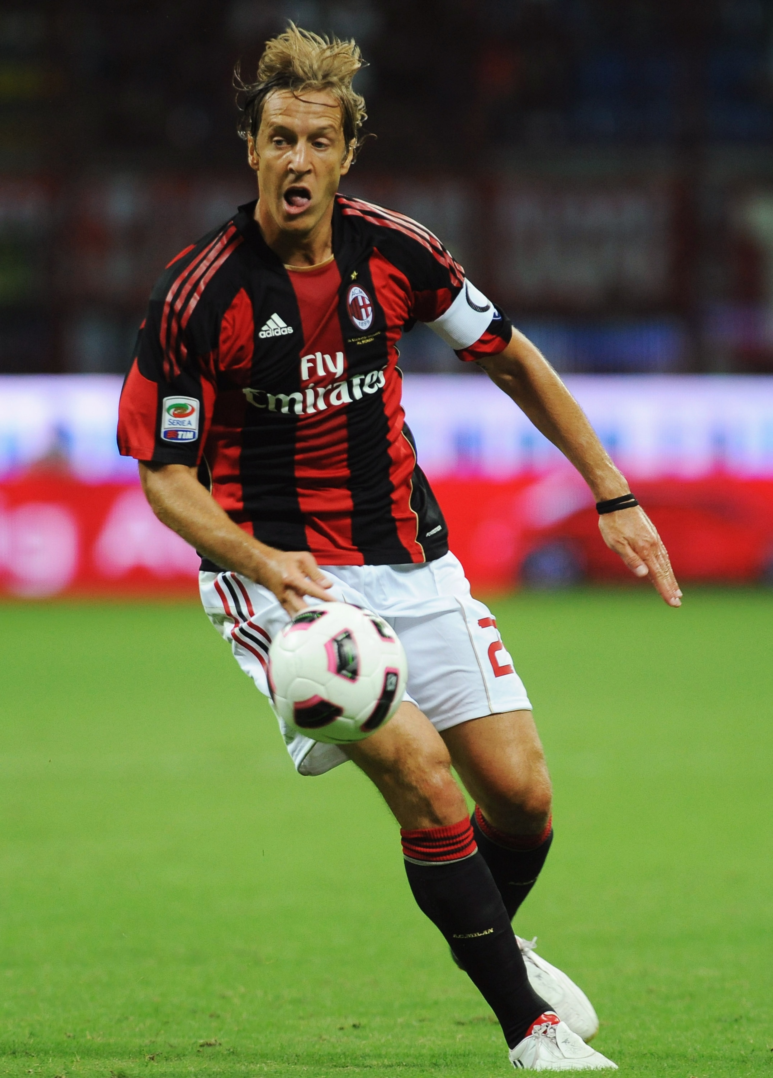 MILAN, ITALY - AUGUST 29:  Massimo Ambrosini of AC Milan in action during the Serie A match between AC Milan and US Lecce at Stadio Giuseppe Meazza on August 29, 2010 in Milan, Italy.  (Photo by Valerio Pennicino/Getty Images)