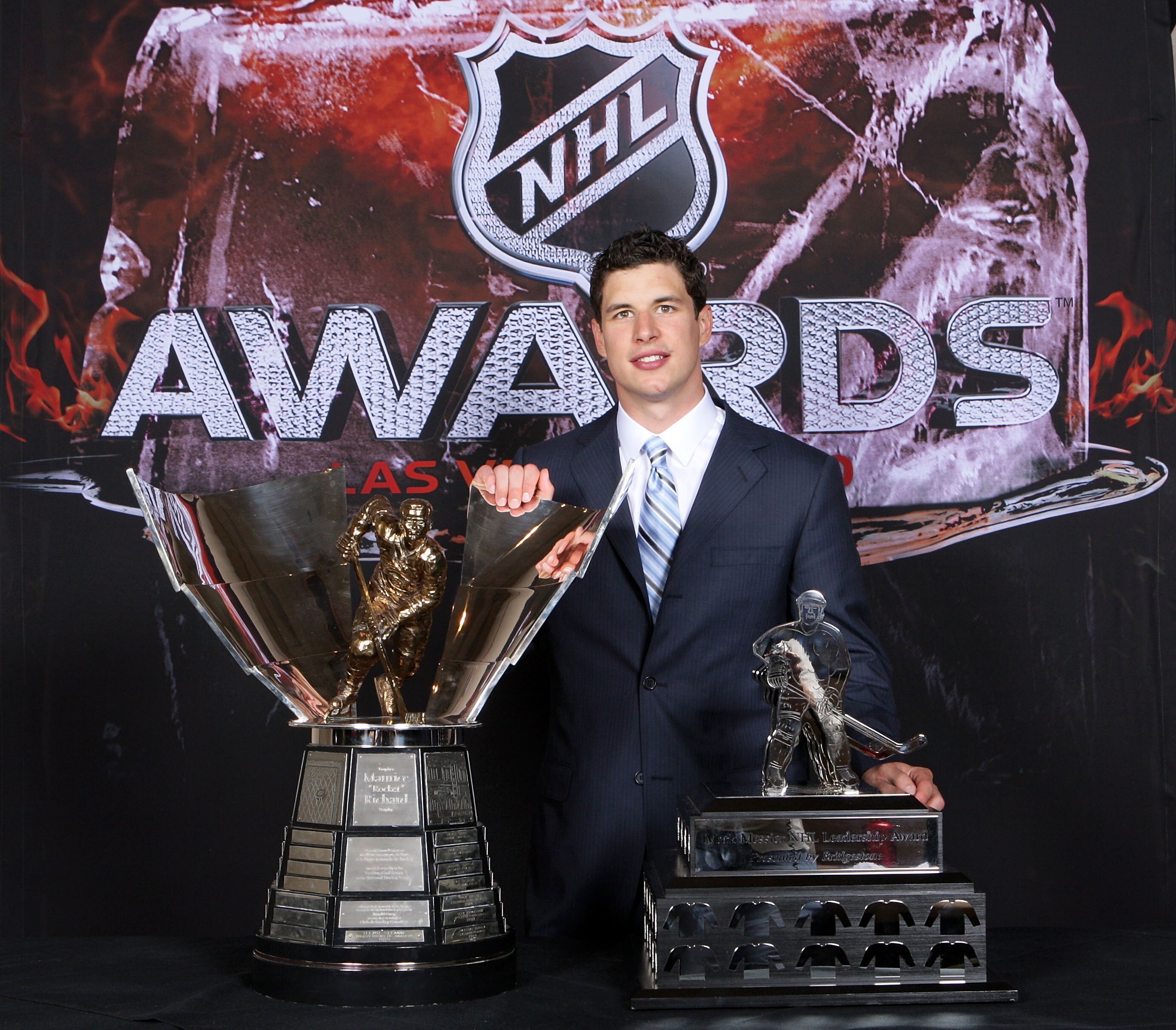 LAS VEGAS - JUNE 23: Sidney Crosby of the Pittsburgh Penguins poses for a portrait with the Maurice Richard Trophy and the Mark Messier NHL Leadership Award during the 2010 NHL Awards at the Palms Casino Resort on June 23, 2010 in Las Vegas, Nevada. (Ph LAS VEGAS - JUNE 23: Sidney Crosby of the Pittsburgh Penguins poses for a portrait with the Maurice Richard Trophy and the Mark Messier NHL Leadership Award during the 2010 NHL Awards at the Palms Casino Resort on June 23, 2010 in Las Vegas, Nevada. (Ph