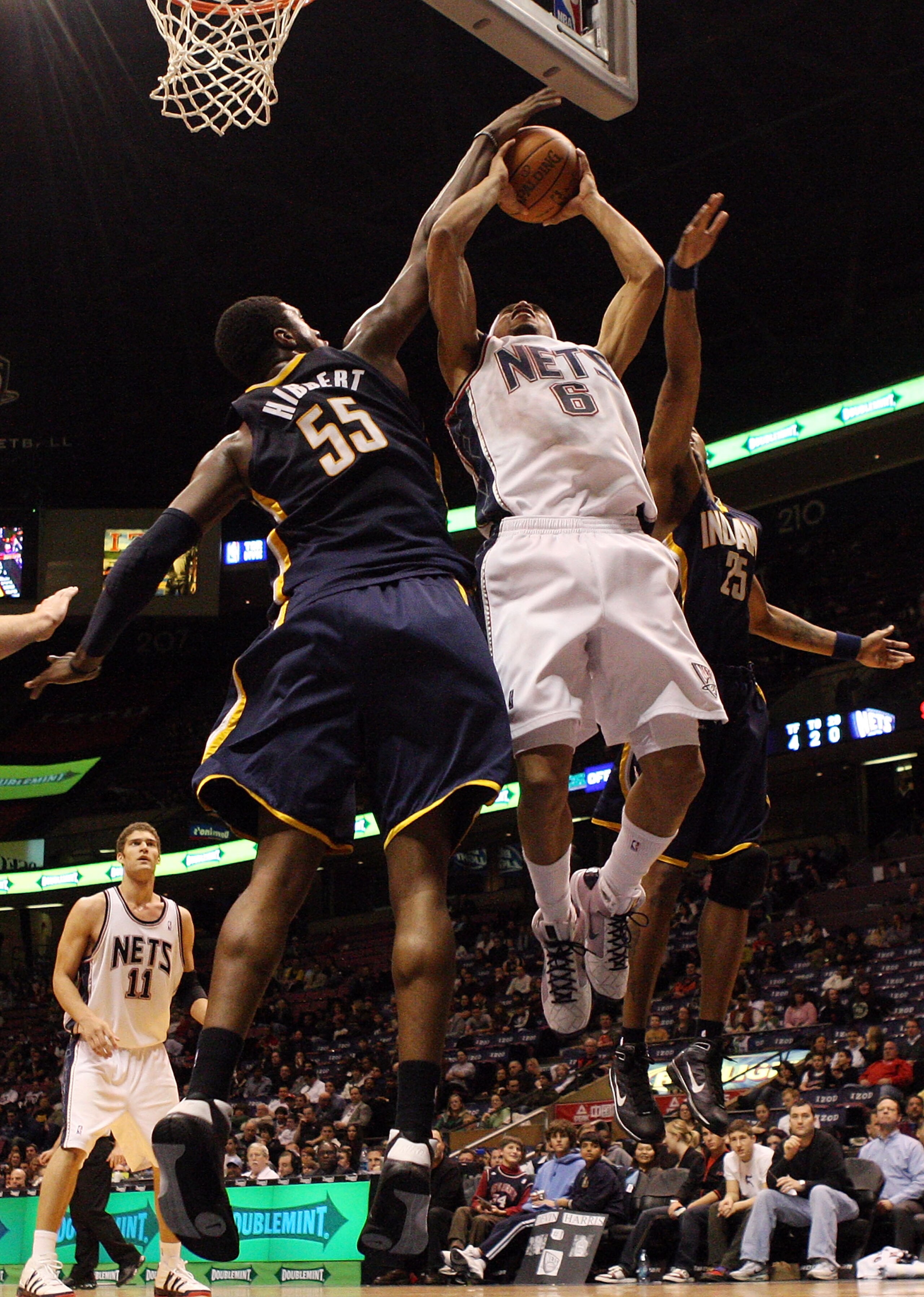 EAST RUTHERFORD, NJ - JANUARY 15:  Courtney Lee #6 of the New Jersey Nets has his shot blocked by Roy Hibbert #55 of the Indiana Pacers at the Izod Center on January 15, 2010 in East Rutherford, New Jersey. NOTE TO USER: User expressly acknowledges and ag