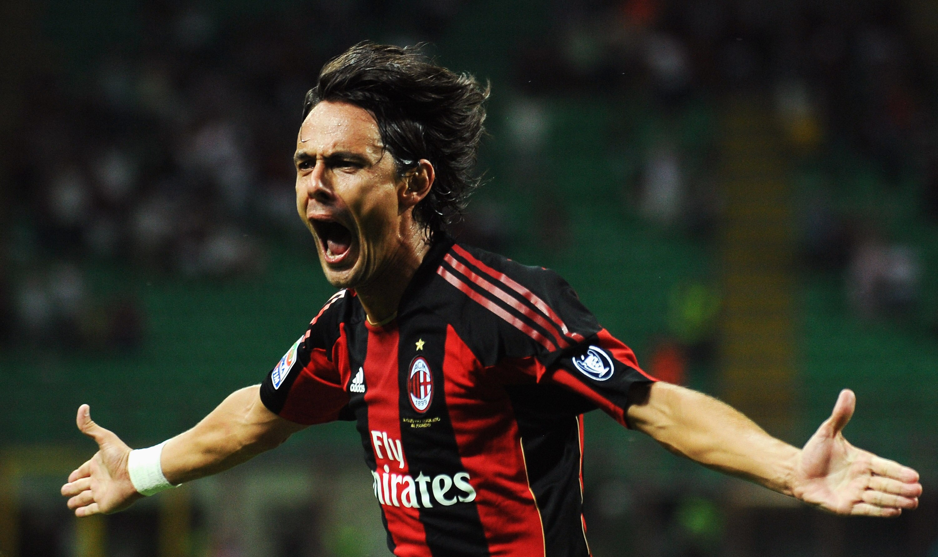 MILAN, ITALY - AUGUST 29:  Filippo Inzaghi of AC Milan celebrates his goal during the Serie A match between AC Milan and US Lecce at Stadio Giuseppe Meazza on August 29, 2010 in Milan, Italy.  (Photo by Valerio Pennicino/Getty Images)