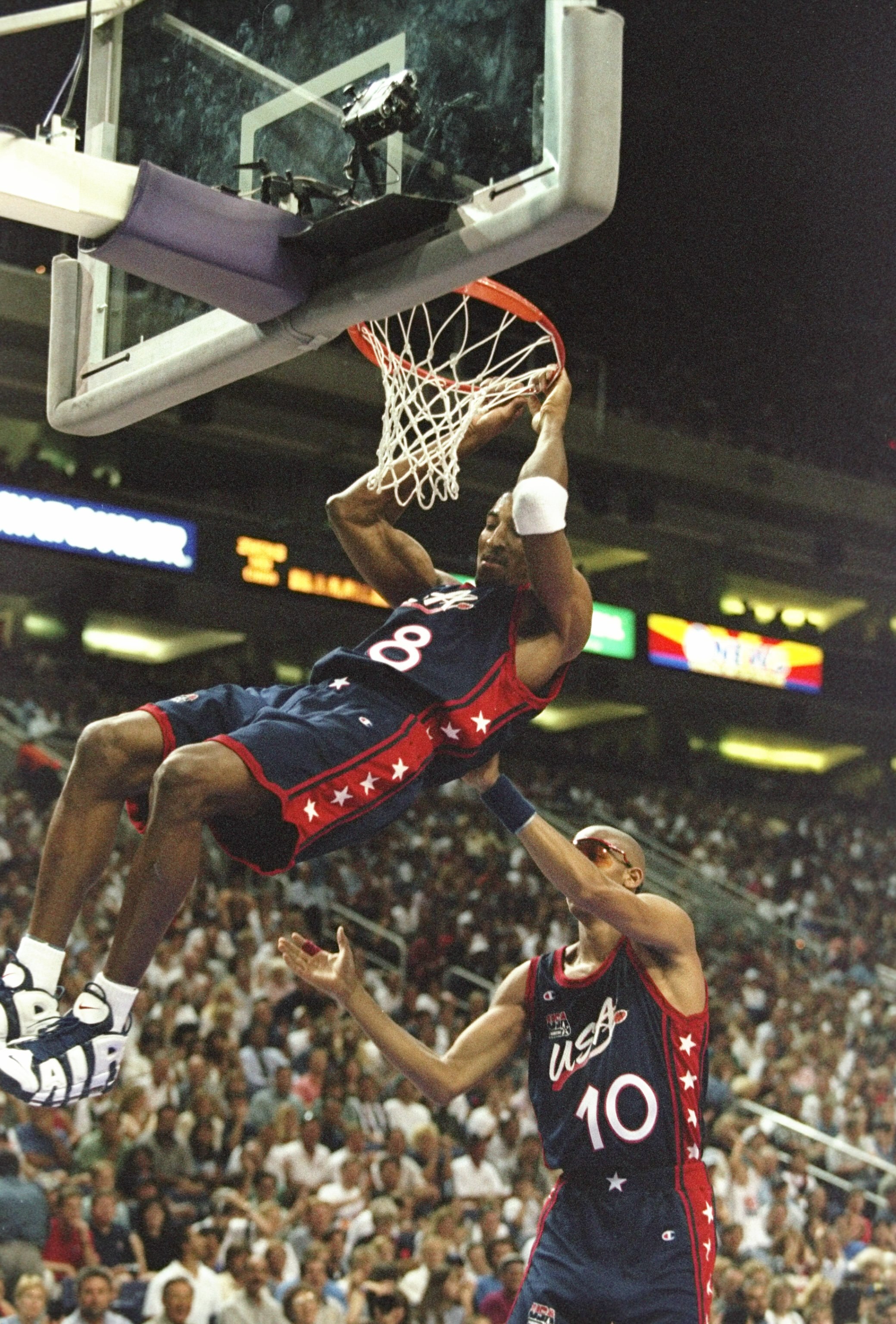 10 Jul 1996:  Forward Scottie Pippen #8 of Dream Team III slam dunks as teammate Reggie Miller lends his support during the USA's 119-58 victory over China at the America West Arena in Phoenix, Arizona. Mandatory Credit: Jed Jacobsohn  /Allsport