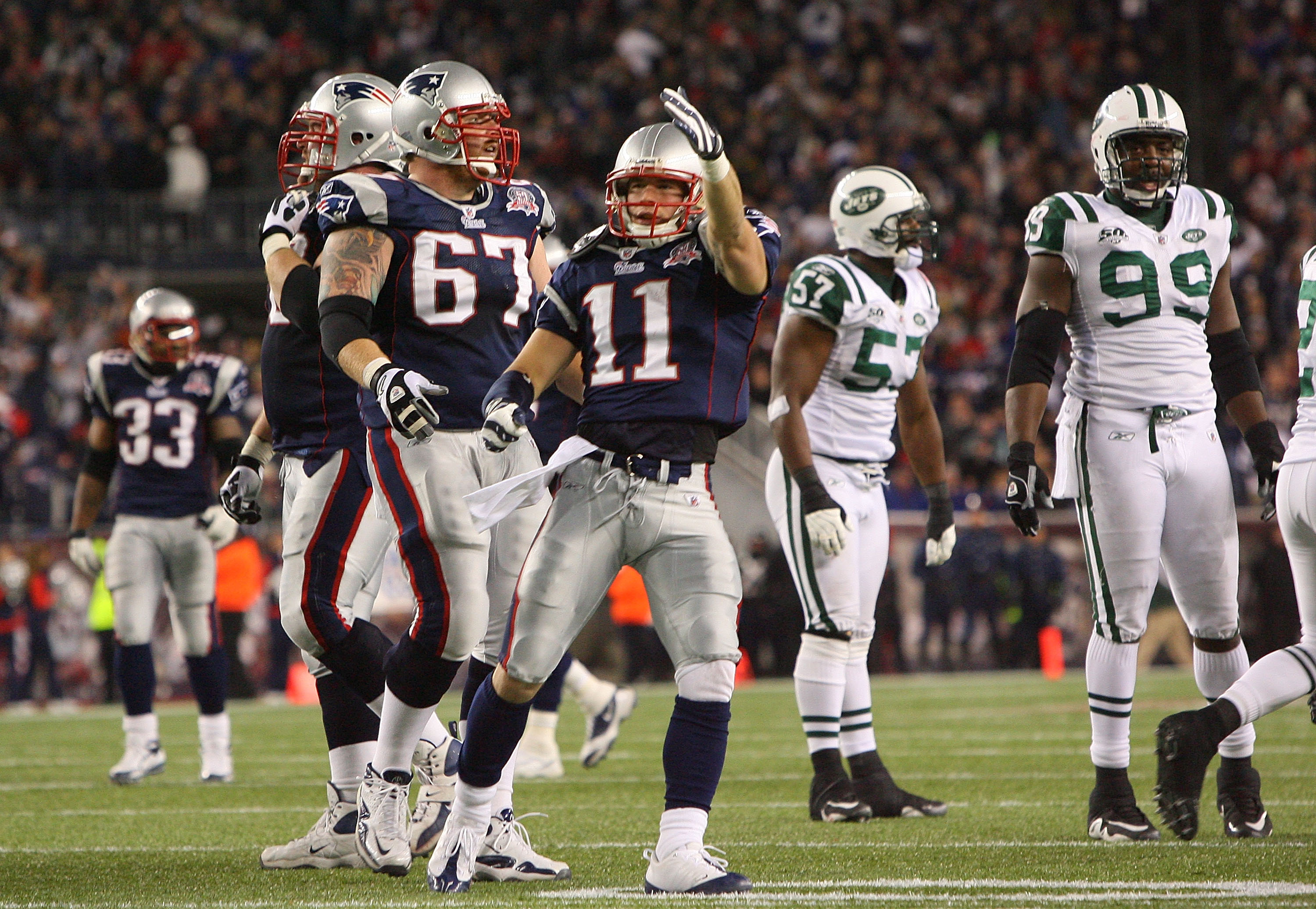 FOXBORO, MA - NOVEMBER 22:  Julian Edelman #11 and Dan Koppen #67 of the New England Patriots react in the fourth quarter against the New York Jets at Gillette Stadium on November 22, 2009 in Foxboro, Massachusetts. The Patriots won 31-14. (Photo by Jim R
