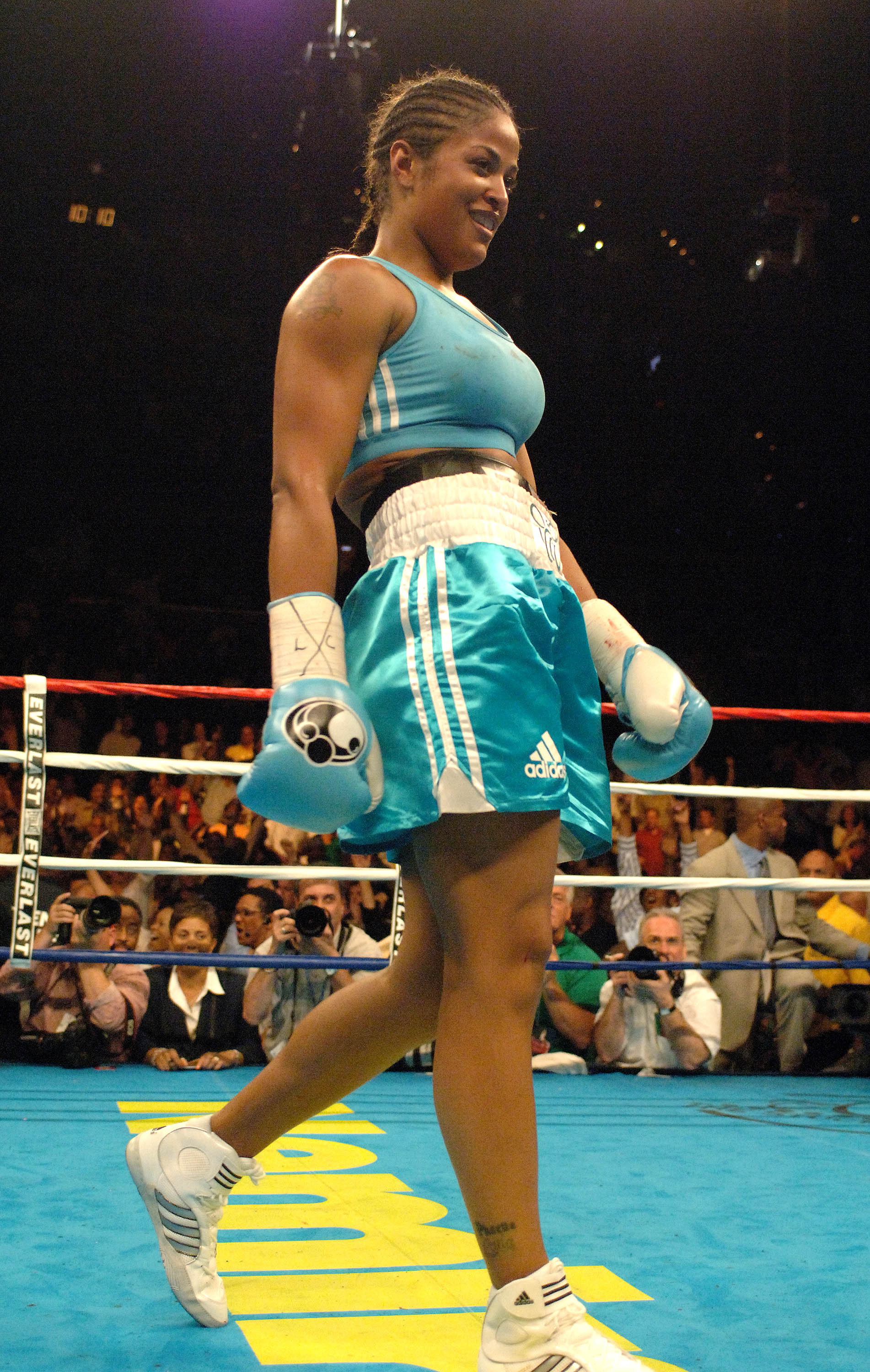 WASHINGTON - JUNE 11:  Laila Ali walks to her corner after stopping Erin Toughill in the 2nd round during their fight for the WBC and WIBA Super Middleweight championship at the MCI Center June 11, 2005 in Washington, DC. Laila Ali won the WBC and WIBA ti