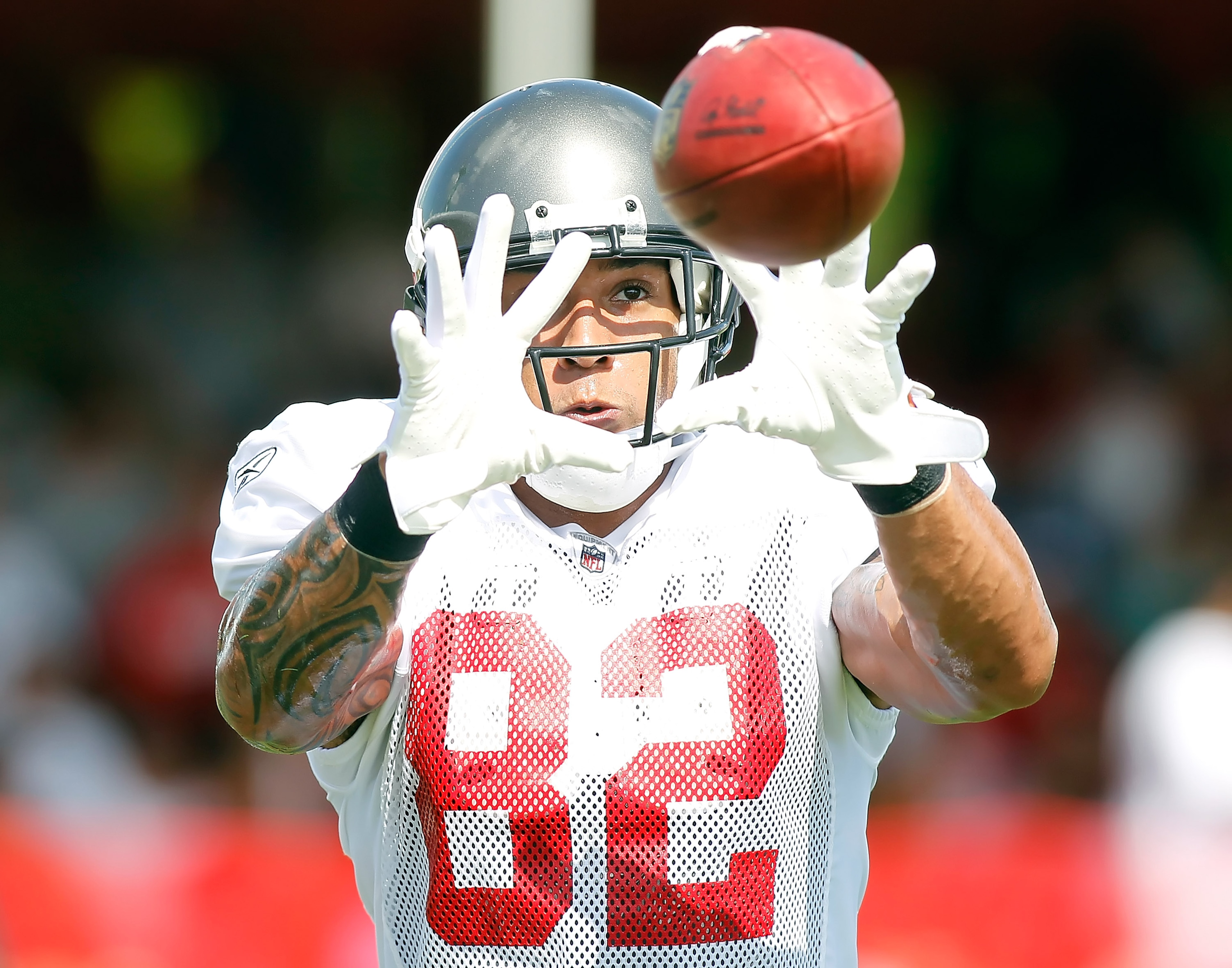 TAMPA - JULY 31:  Tightend Kellen Winslow #82 of the Tampa Bay Buccaneers catches a pass during training camp at One Buccaneer Place on July 31, 2010 in Tampa, Florida.  (Photo by J. Meric/Getty Images)
