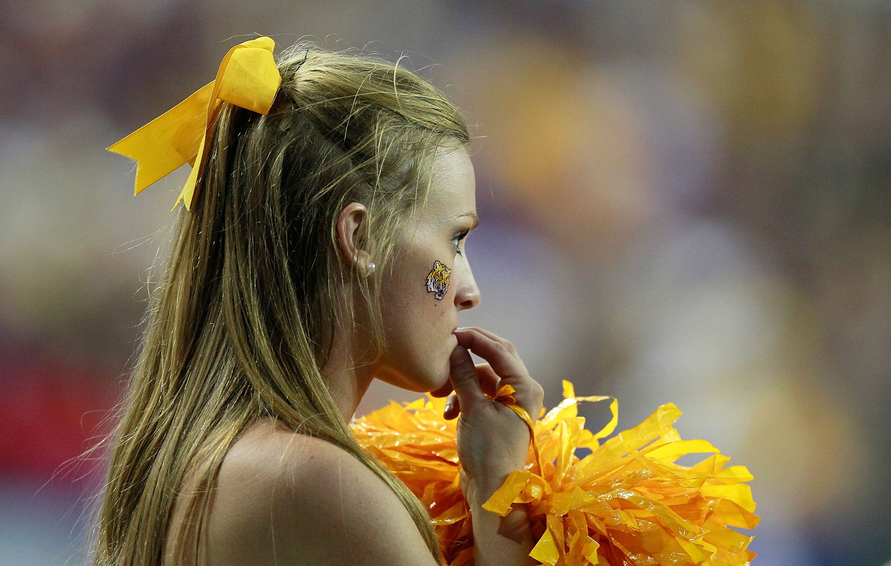 ATLANTA - SEPTEMBER 04:  A cheerleader for the LSU Tigers against the North Carolina Tar Heels during the Chick-fil-A Kickoff Game at Georgia Dome on September 4, 2010 in Atlanta, Georgia.  (Photo by Kevin C. Cox/Getty Images)