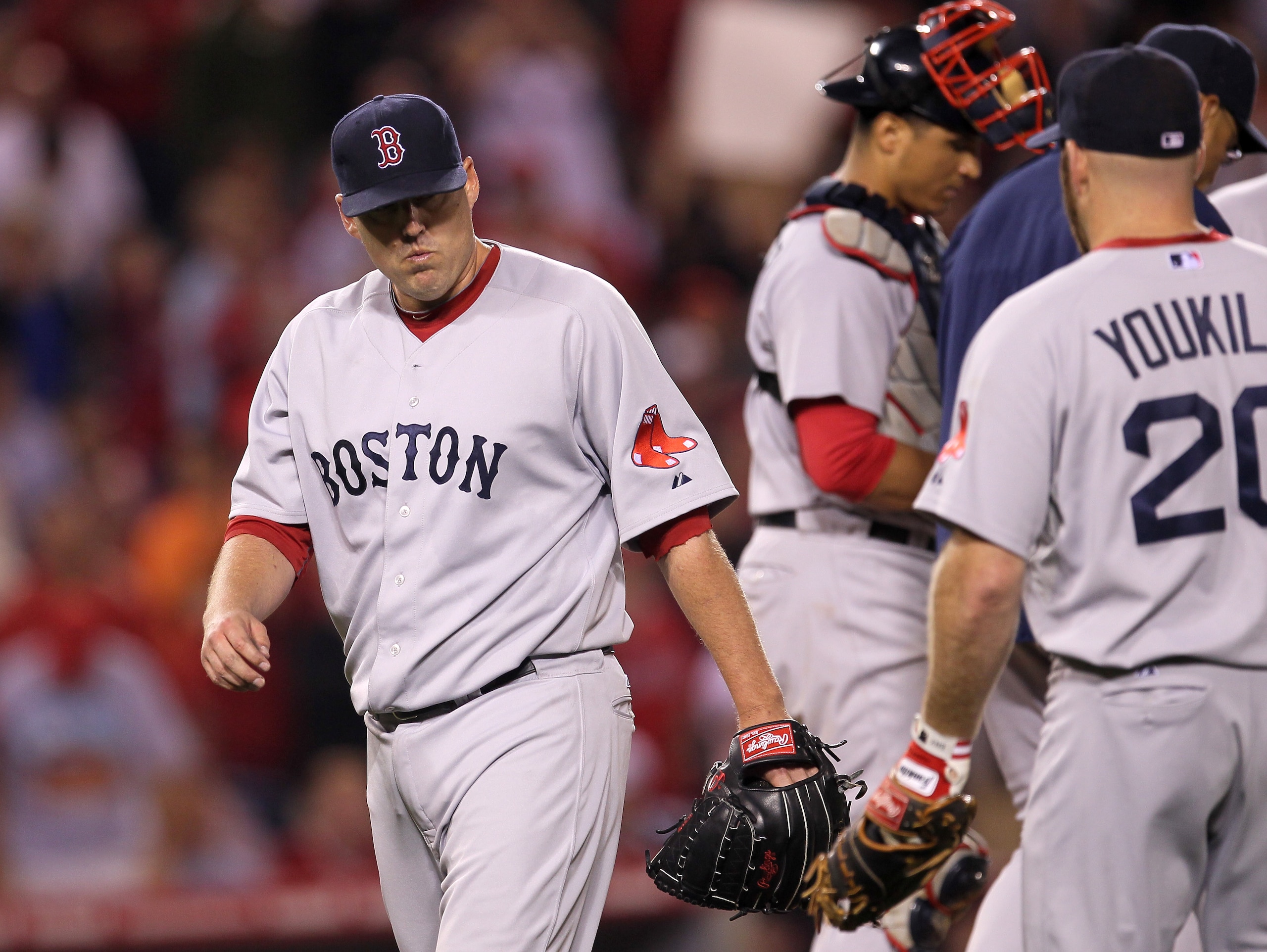 ANAHEIM, CA - JULY 27:  Starting pitcher John Lackey #40 of the Boston Red Sox walks off the mound after being relieved in the eighth inning against the Los Angeles Angels of Anaheim on July 27, 2010 at Angel Stadium in Anaheim, California.  (Photo by Ste