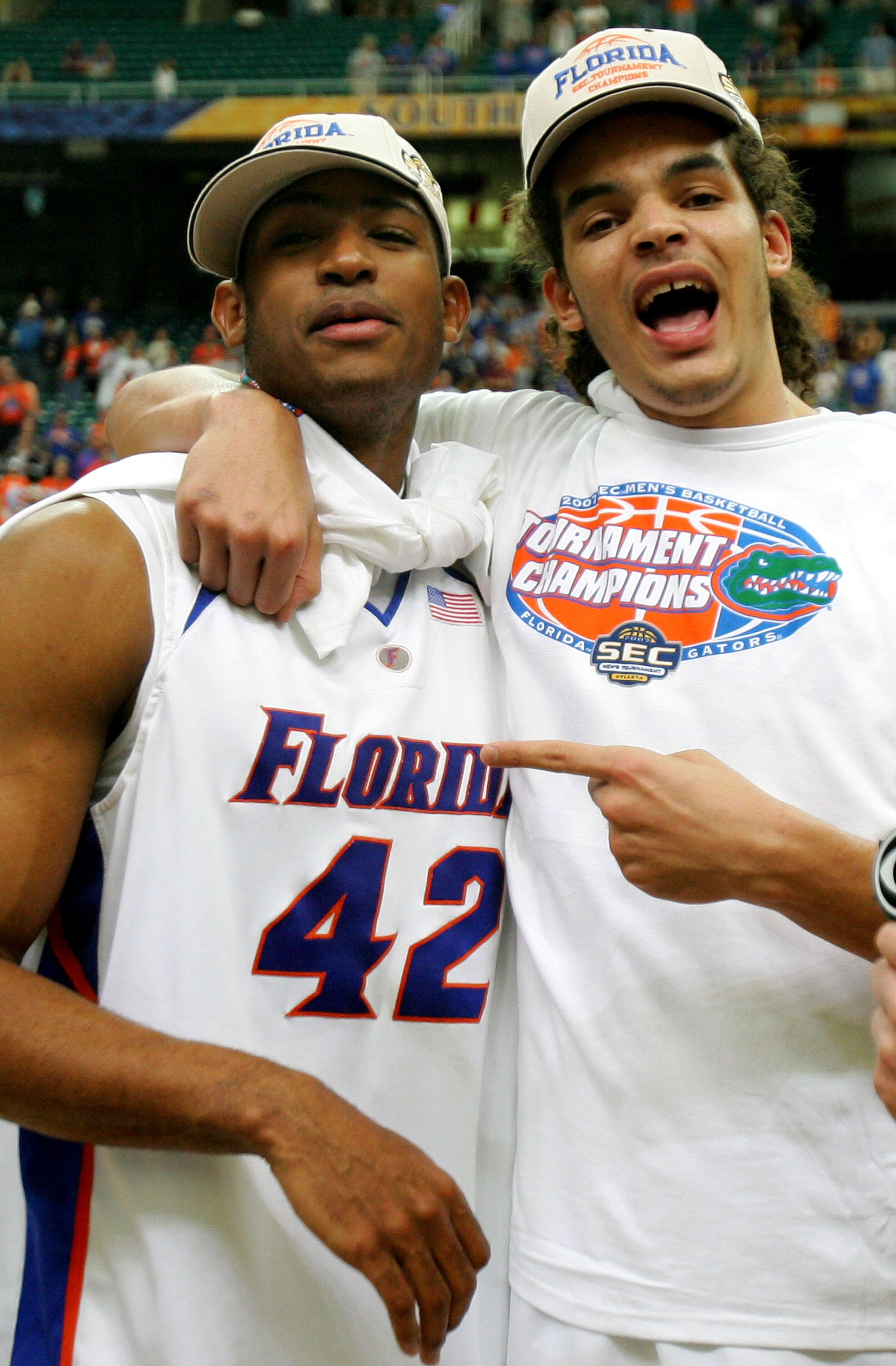 ATLANTA - MARCH 11: Joakim Noah #13 and Al Horford #42 of the Florida Gators celebrate after a 77-56 victory over the Arkansas Razorbacks in the championship game of the Southeastern Conference Men's Basketball Tournament on March 11, 2007 at the Georgia ATLANTA - MARCH 11: Joakim Noah #13 and Al Horford #42 of the Florida Gators celebrate after a 77-56 victory over the Arkansas Razorbacks in the championship game of the Southeastern Conference Men's Basketball Tournament on March 11, 2007 at the Georgia