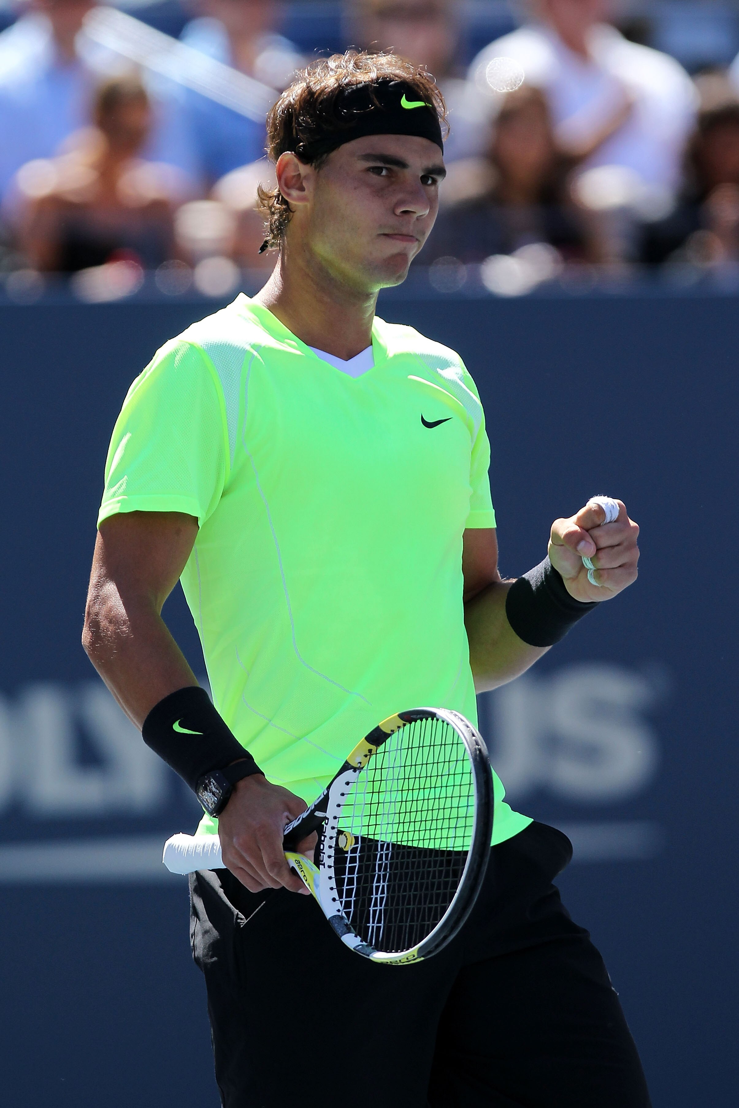 NEW YORK - SEPTEMBER 11:  Rafael Nadal of Spain reacts while playing against Mikhail Youzhny of Russia during his men's singles semifinal match on day thirteen of the 2010 U.S. Open at the USTA Billie Jean King National Tennis Center on September 11, 2010