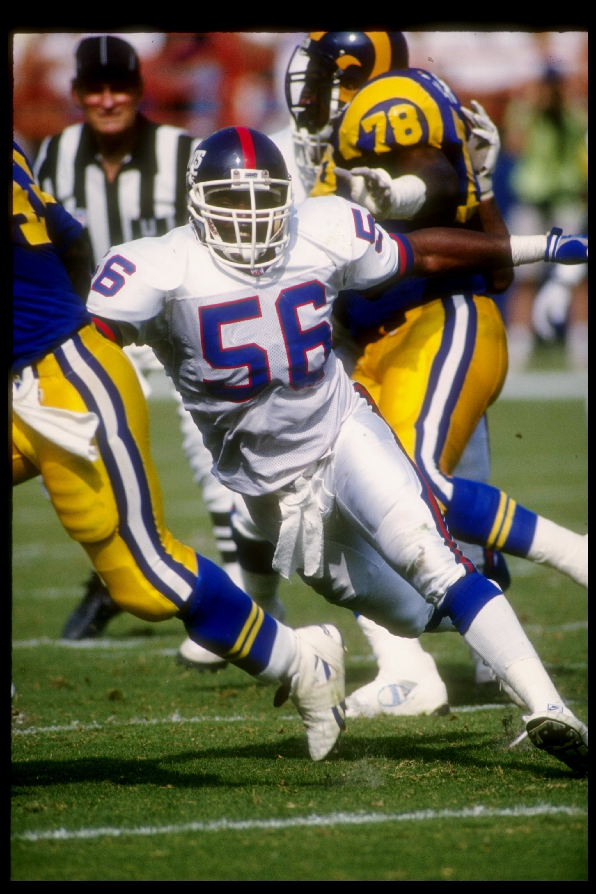 18 Oct 1992:  Linebacker Lawrence Taylor of the New York Giants moves down the field during a game against the Los Angeles Rams at Anaheim Stadium in Anaheim, California.  The Rams won the game, 38-17. Mandatory Credit: Ken Levine  /Allsport