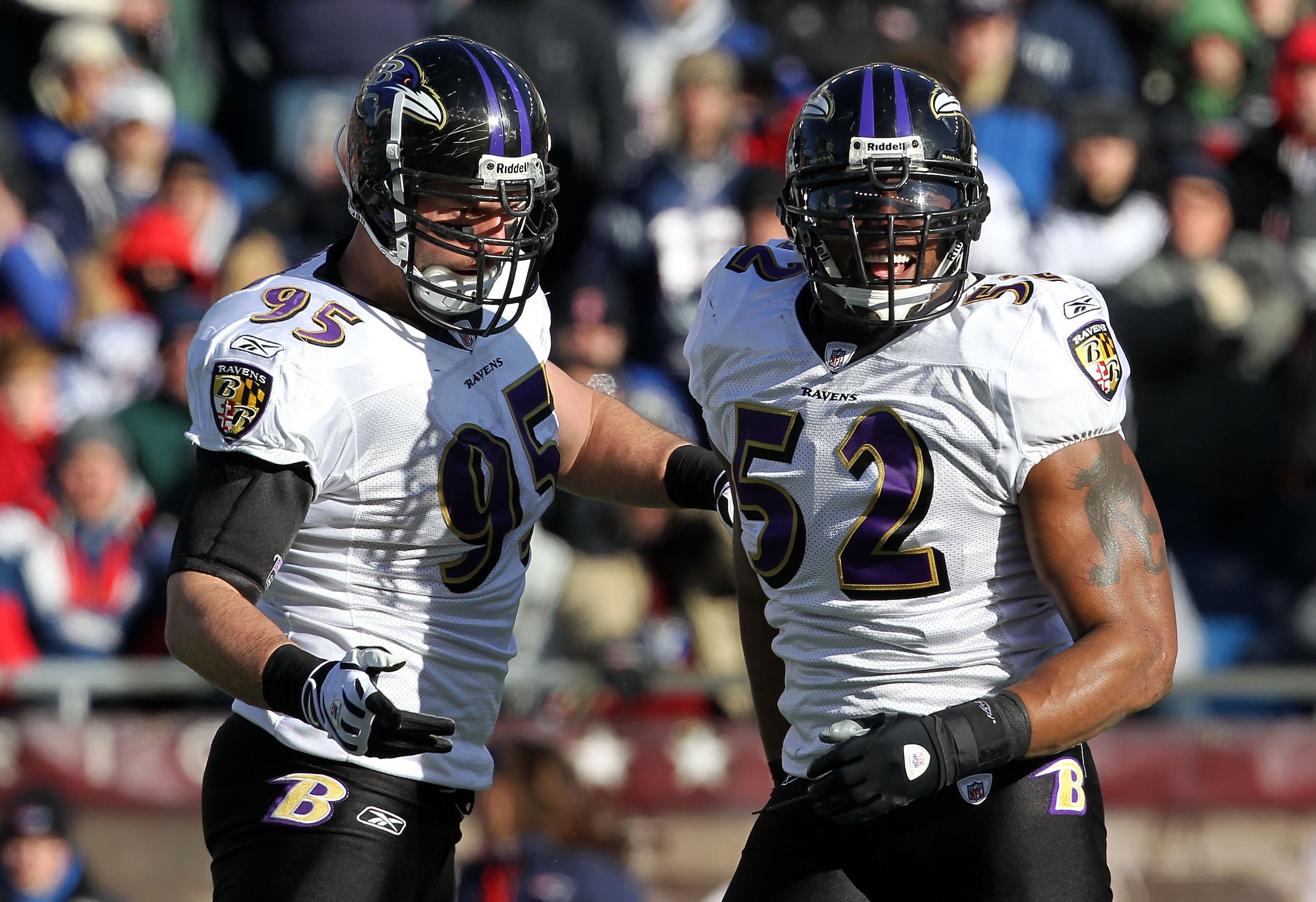 FOXBORO, MA - JANUARY 10:  (L-R) Jarrett Johnson #95 and Ray Lewis #52 of the Baltimore Ravens react after Lewis acked Tom Brady #12 of the New England Patriots during the first quarter pf the 2010 AFC wild-card playoff game at Gillette Stadium on January