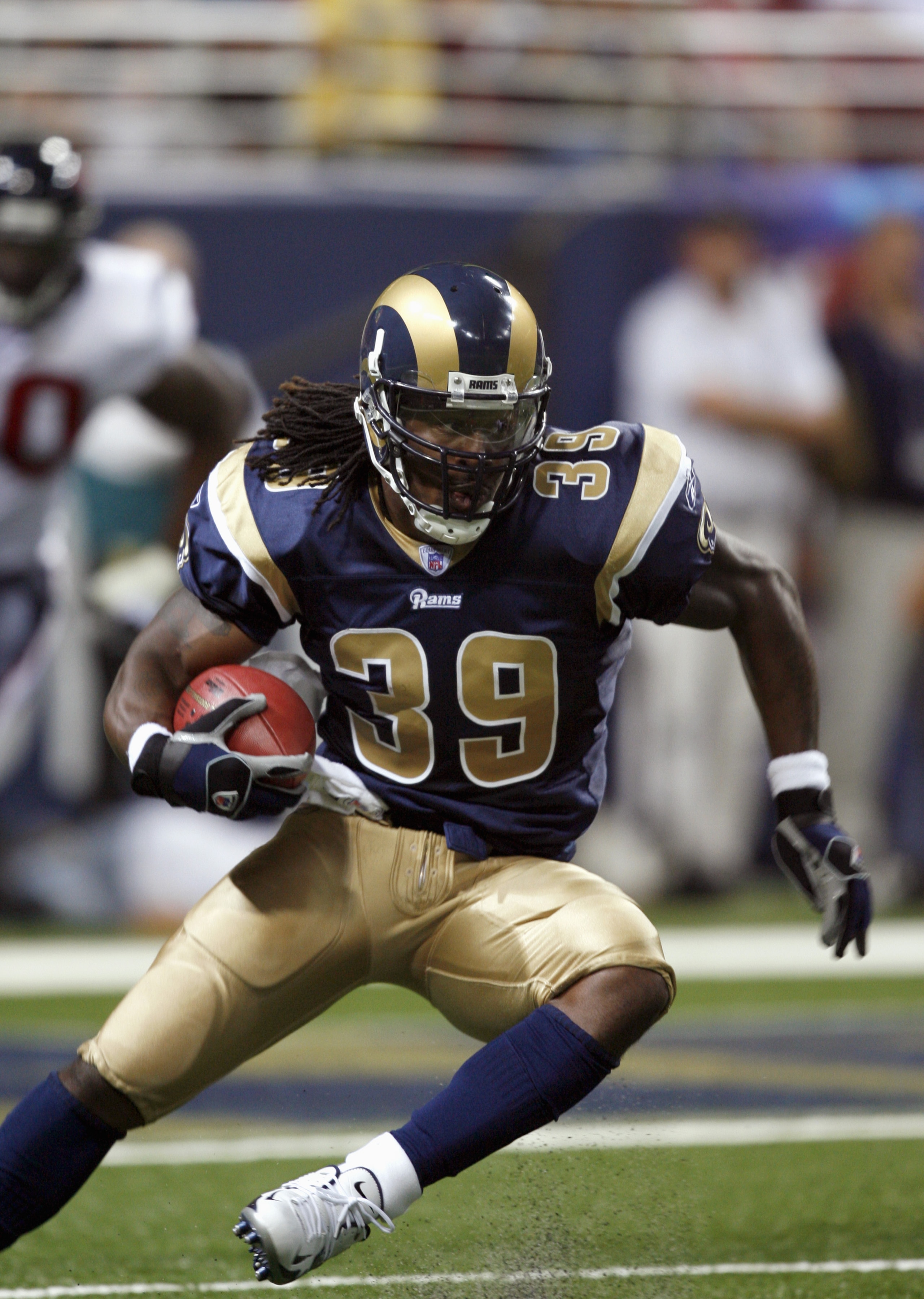 ST. LOUIS - AUGUST 19: Stephen Jackson #39 of the St. Louis Rams rushes against the Houston Texans on August 19, 2006 at the Edward Jones Dome in St. Louis, Missouri. (Photo by Dilip Vishwanat/Getty Images)