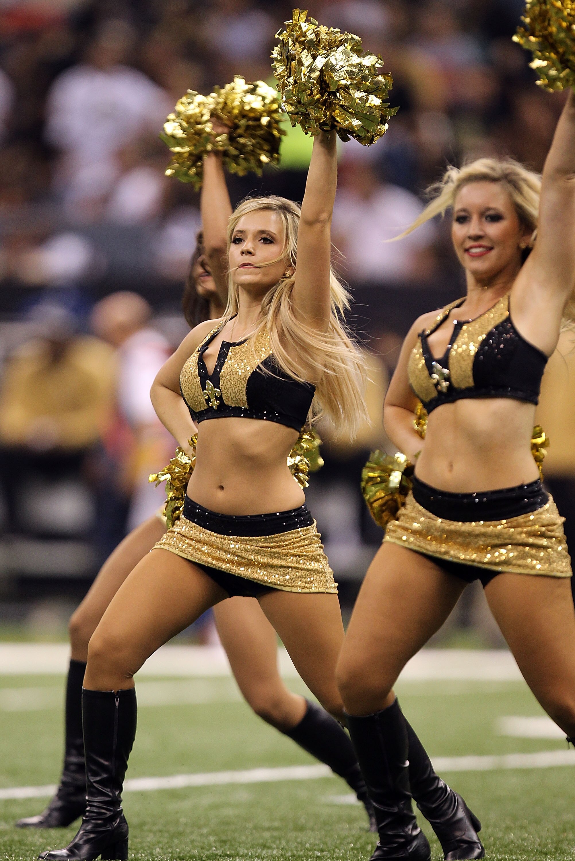 NEW ORLEANS - SEPTEMBER 09:  A Saintsation cheerleader performs at Louisiana Superdome on September 9, 2010 in New Orleans, Louisiana.  (Photo by Ronald Martinez/Getty Images)