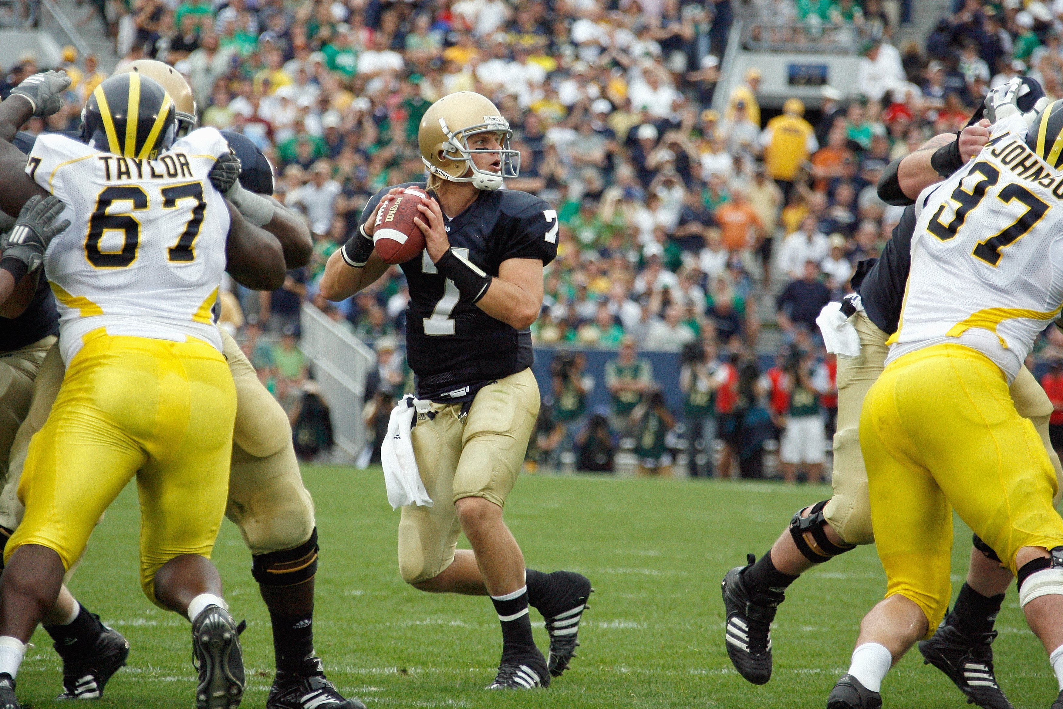 SOUTH BEND,IN - SEPTEMBER 13:  Jimmy Clausen #7 of the Notre Dame Fighting Irish drops back to pass the ball during the game against the Michigan Wolverines on September 13, 2008 at Notre Dame Stadium in South Bend, Indiana. (Photo by: Gregory Shamus/Gett