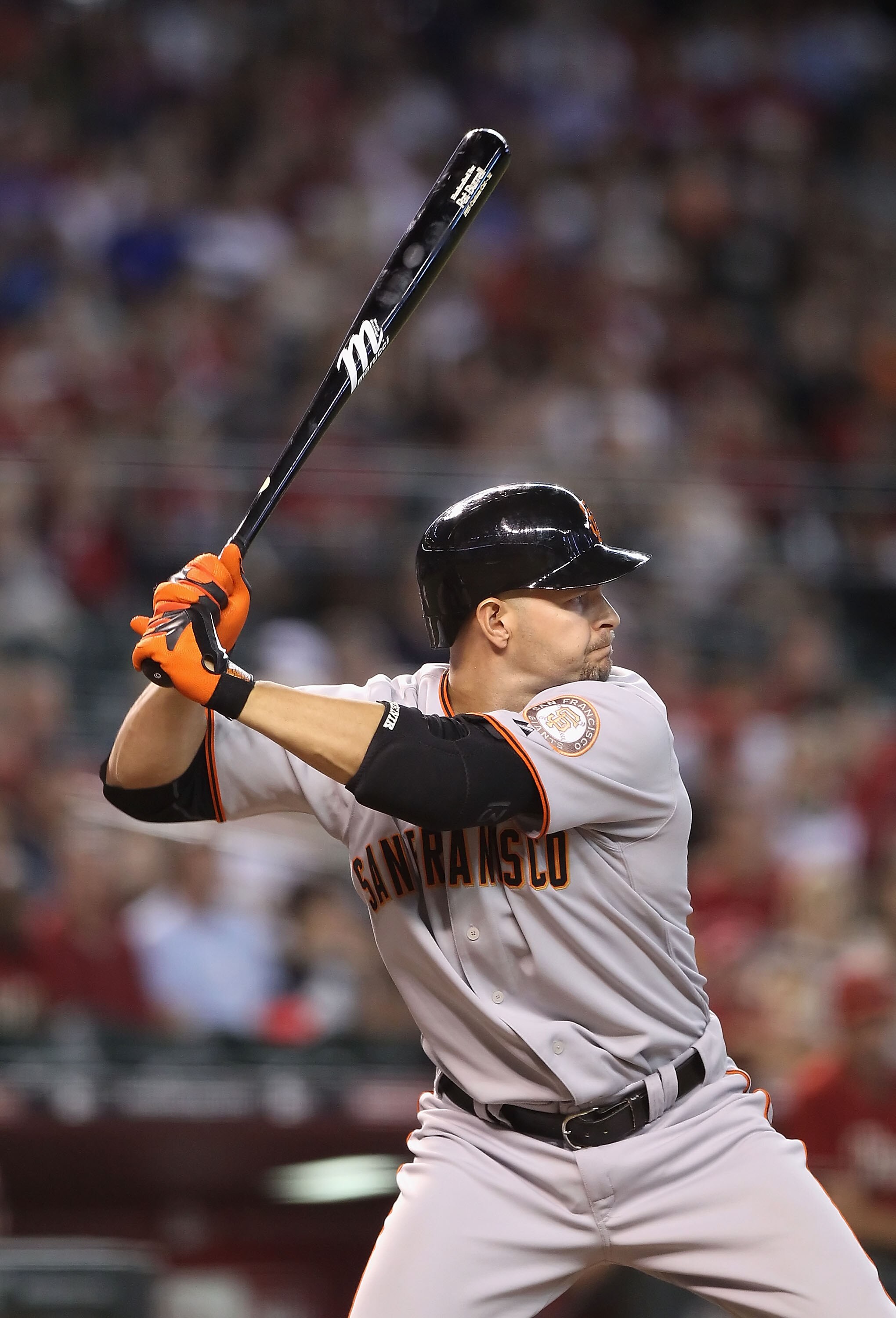 PHOENIX - SEPTEMBER 06:  Cody Ross #13 of the San Francisco Giants at bat during the Major League Baseball game against the Arizona Diamondbacks at Chase Field on September 6, 2010 in Phoenix, Arizona. The Giants defeated the Diamondbacks 2-0 in eleven in