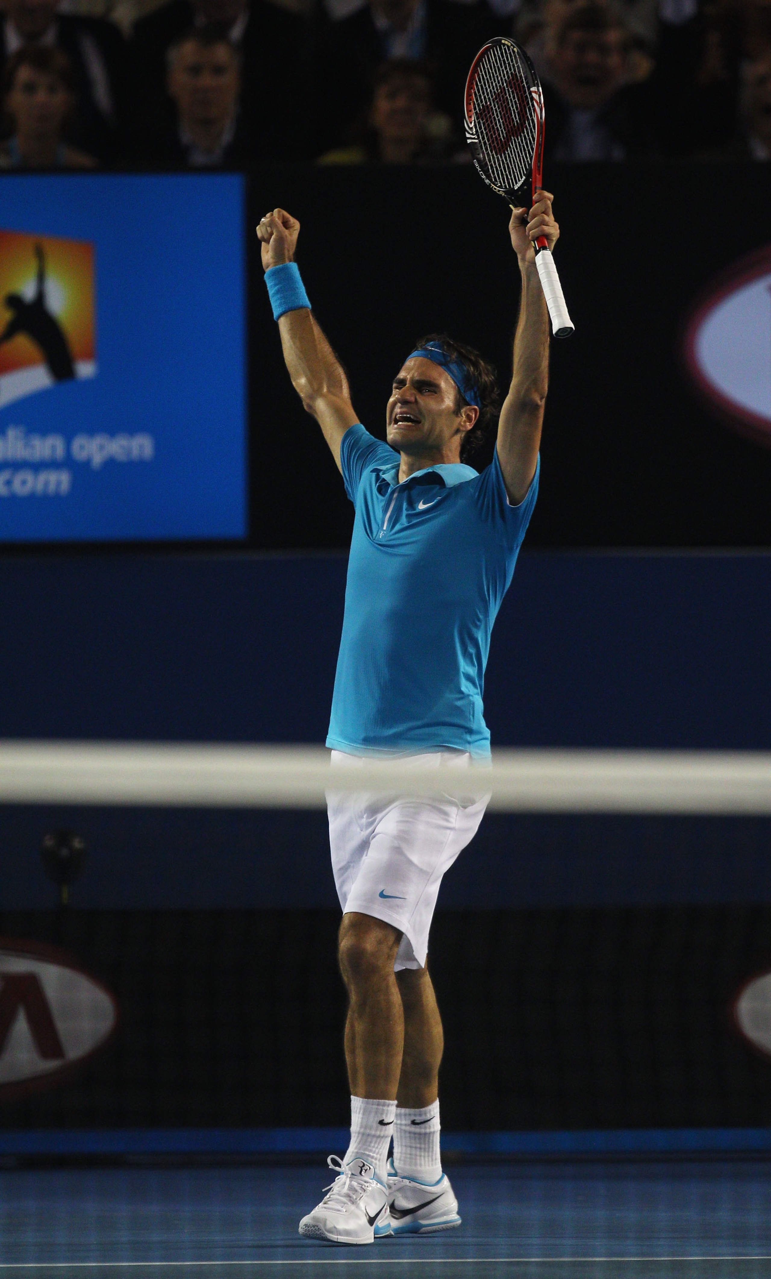 MELBOURNE, AUSTRALIA - JANUARY 31:  Roger Federer of Switzerland celebrates championship point in his men's final match against Andy Murray of Great Britain during day fourteen of the 2010 Australian Open at Melbourne Park on January 31, 2010 in Melbourne