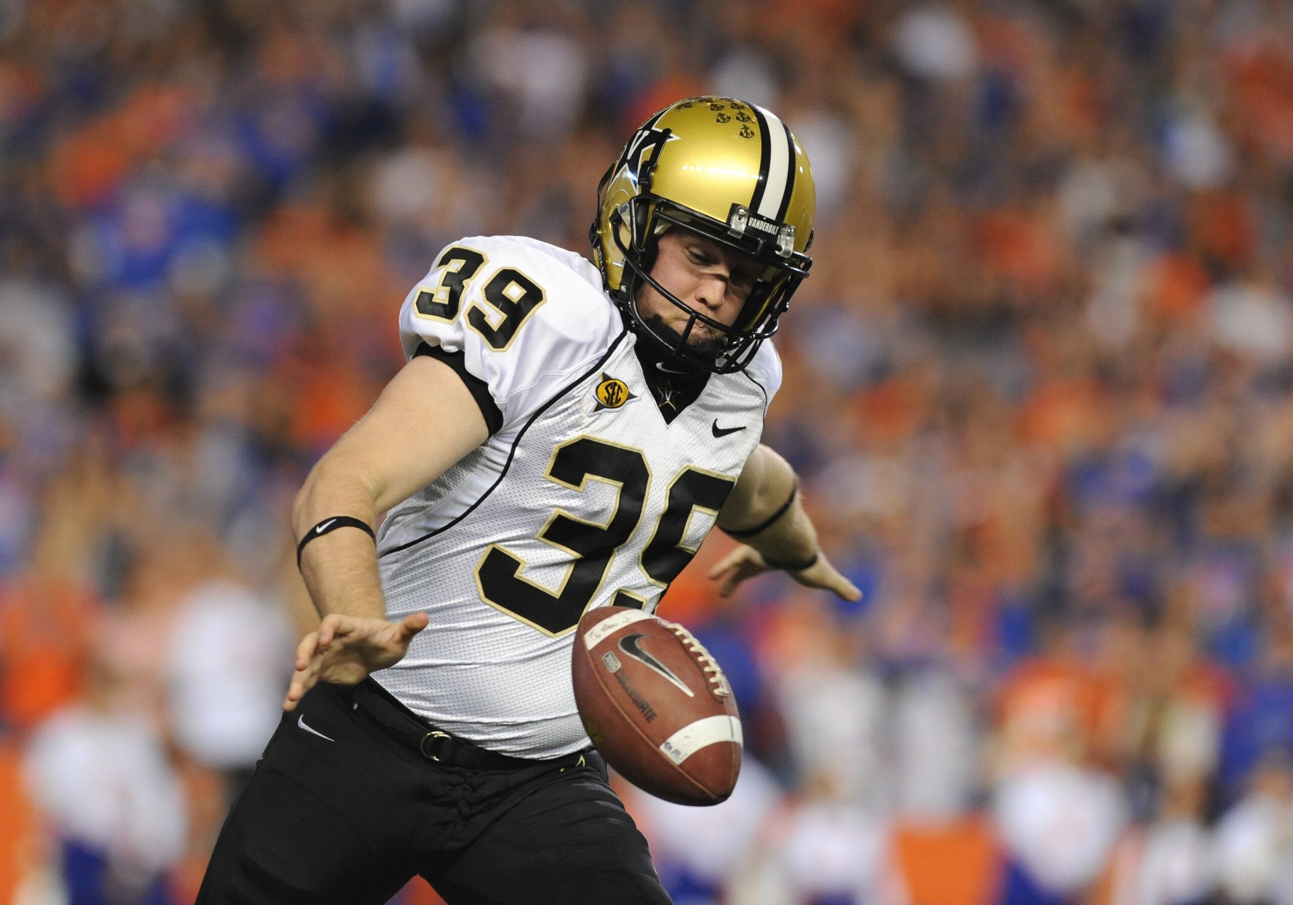 GAINESVILLE, FL - NOVEMBER 7: Punter Brett Upson #39 of the Vanderbilt Commodores kicks after a high snap from center against the Florida Gators on November 7, 2009 at Ben Hill Griffin Stadium in Gainesville, Florida.  (Photo by Al Messerschmidt/Getty Ima