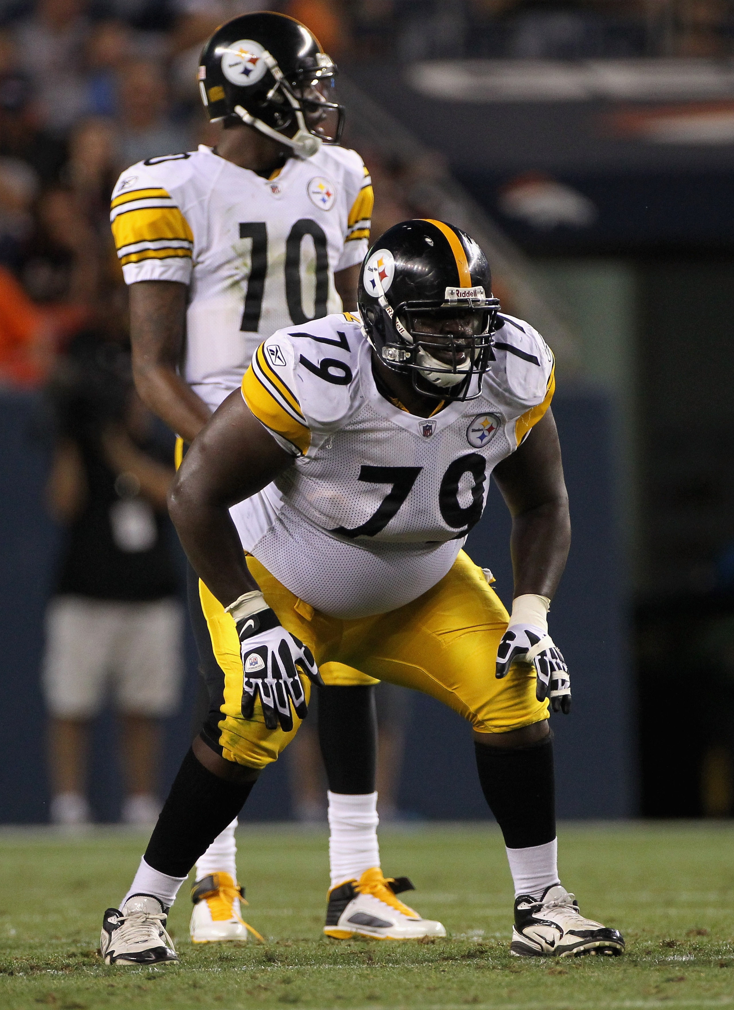 DENVER - AUGUST 29:  Offensive guard Chris Kemoeatu #68 of the Pittsburgh Steelers prepares to defend quarterback Dennis Dixon #10 against the Denver Broncos during preseason NFL action at INVESCO Field at Mile High on August 29, 2010 in Denver, Colorado.