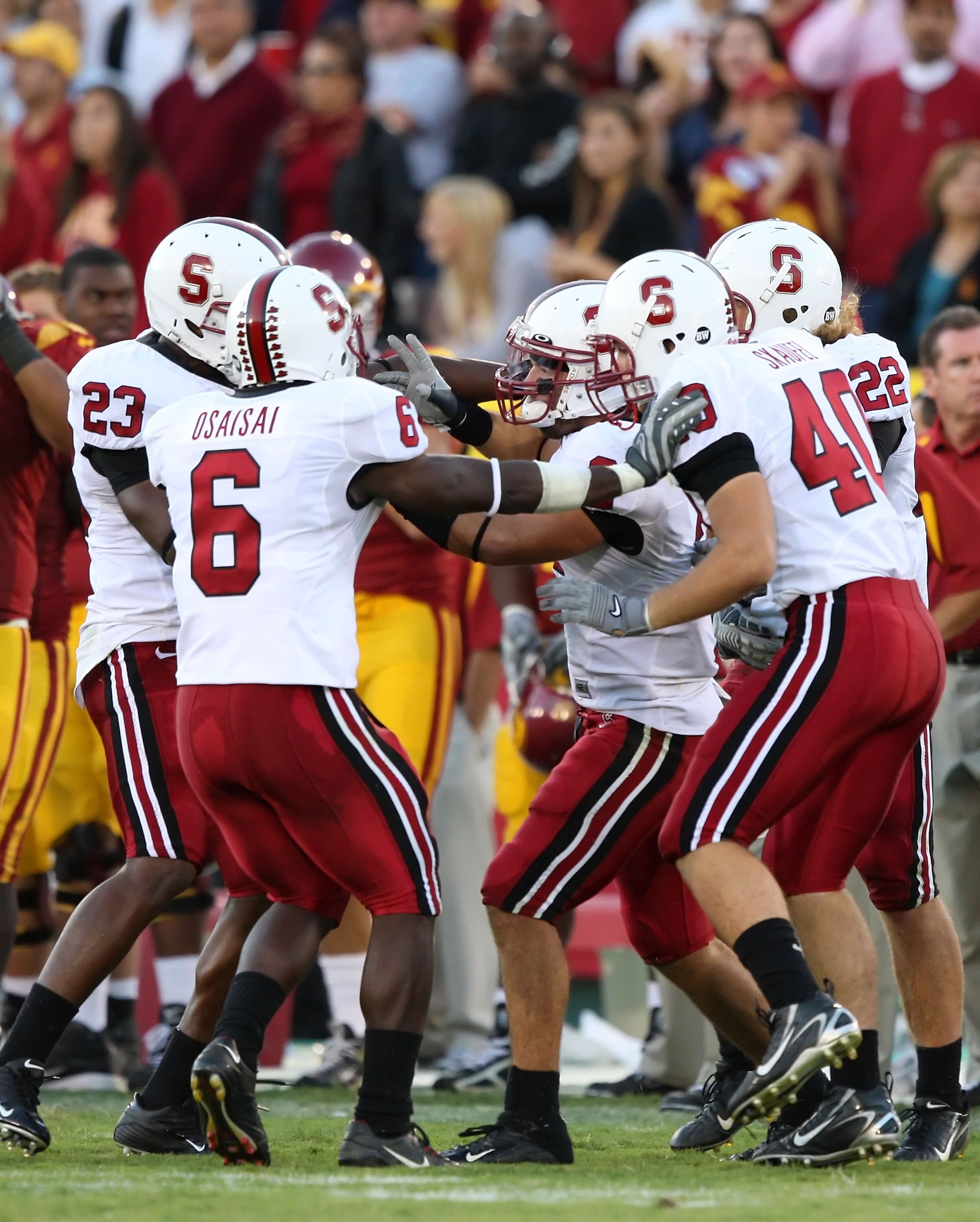 LOS ANGELES - OCTOBER 6:  Nick Sanchez #2 (C) of the Stanford University Cardinal celebrates with his teammates during the game against the USC Trojans at the Los Angeles Memorial Coliseum October 6, 2007 in Los Angeles, California. Stanford defeated USC
