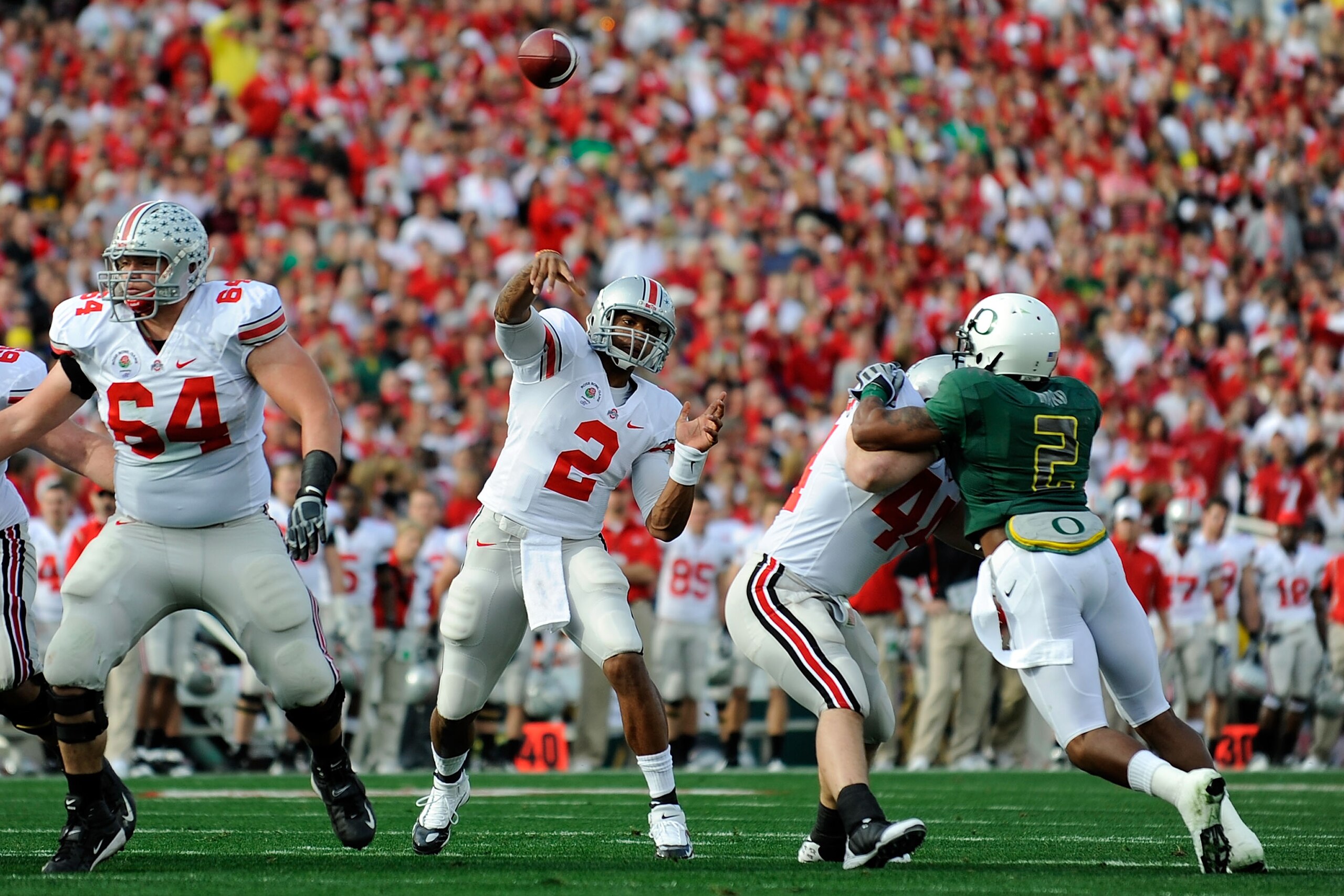 PASADENA, CA - JANUARY 01:  Quarterback Terrelle Pryor #2 of the Ohio State Buckeyes throws a pass against the Oregon Ducks at the 96th Rose Bowl game on January 1, 2010 in Pasadena, California.  (Photo by Kevork Djansezian/Getty Images)