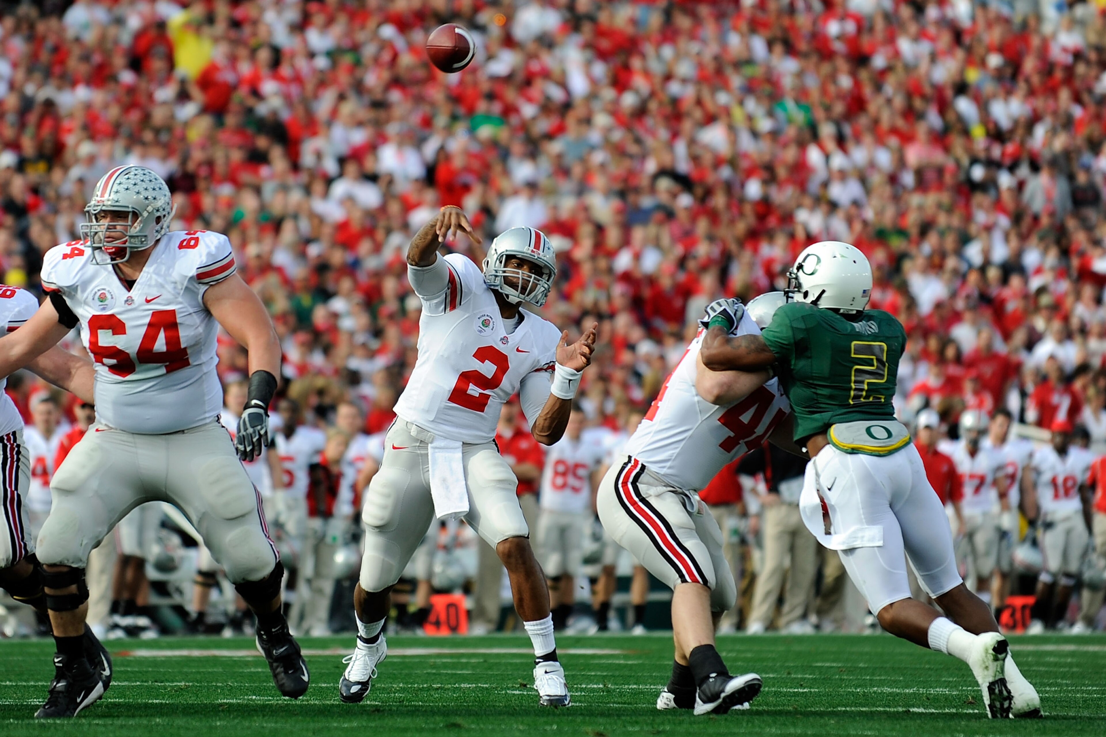 PASADENA, CA - JANUARY 01:  Quarterback Terrelle Pryor #2 of the Ohio State Buckeyes throws a pass against the Oregon Ducks at the 96th Rose Bowl game on January 1, 2010 in Pasadena, California.  (Photo by Kevork Djansezian/Getty Images)