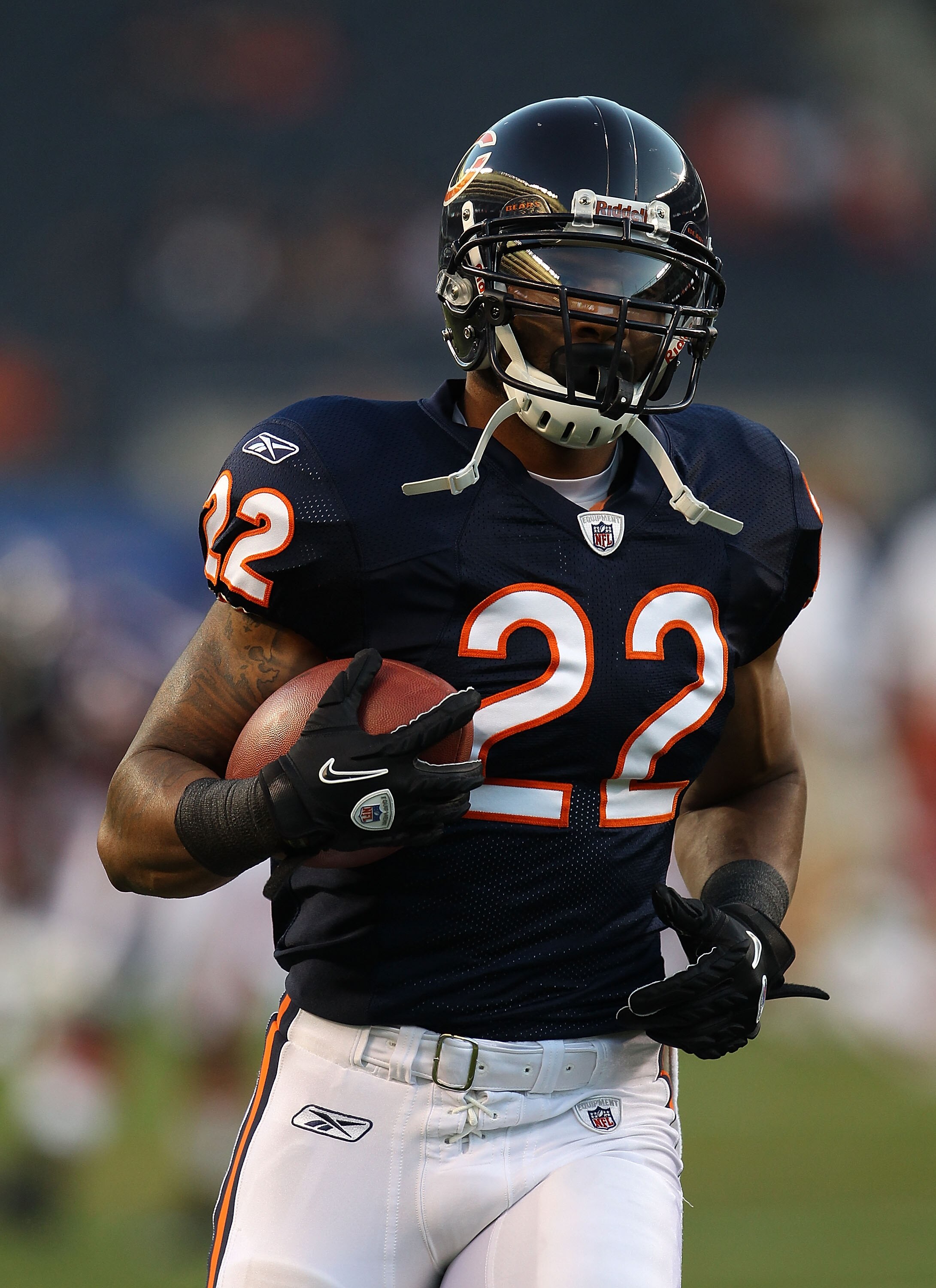 CHICAGO - AUGUST 28: Matt Forte #22 of the Chicago Bears participates in warm-ups before a preseason game against the Arizona Cardinals at Soldier Field on August 28, 2010 in Chicago, Illinois. The Cardinals defeated the Bears 14-9. (Photo by Jonathan Dan