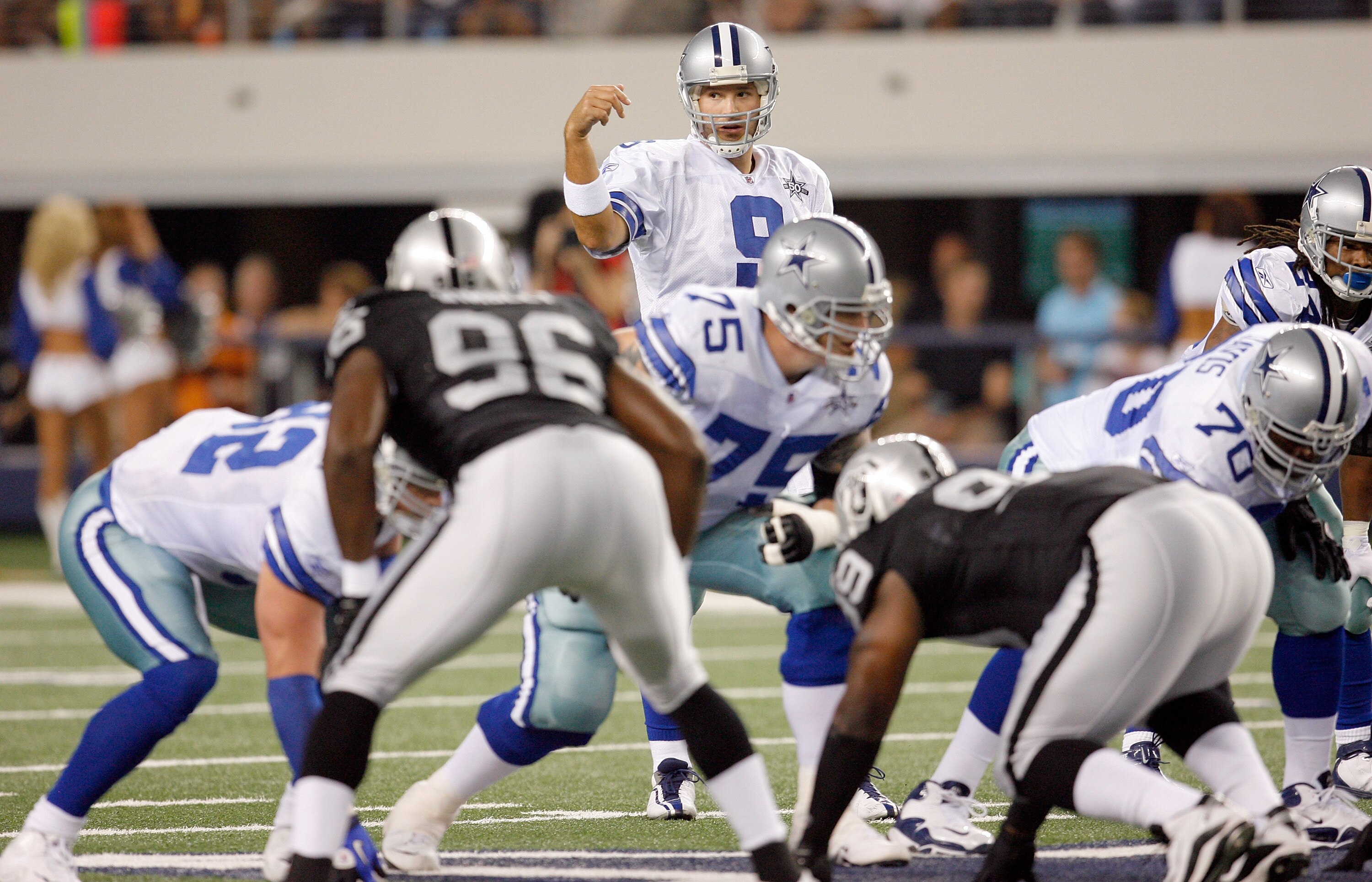 ARLINGTON, TX - AUGUST 12: Tony Romo #9 calls the play during the preseason game against the Oakland Raiders at Dallas Cowboys Stadium on August 12, 2010 in Arlington, Texas. (Photo by Tom Pennington/Getty Images) ARLINGTON, TX - AUGUST 12: Tony Romo #9 calls the play during the preseason game against the Oakland Raiders at Dallas Cowboys Stadium on August 12, 2010 in Arlington, Texas. (Photo by Tom Pennington/Getty Images)