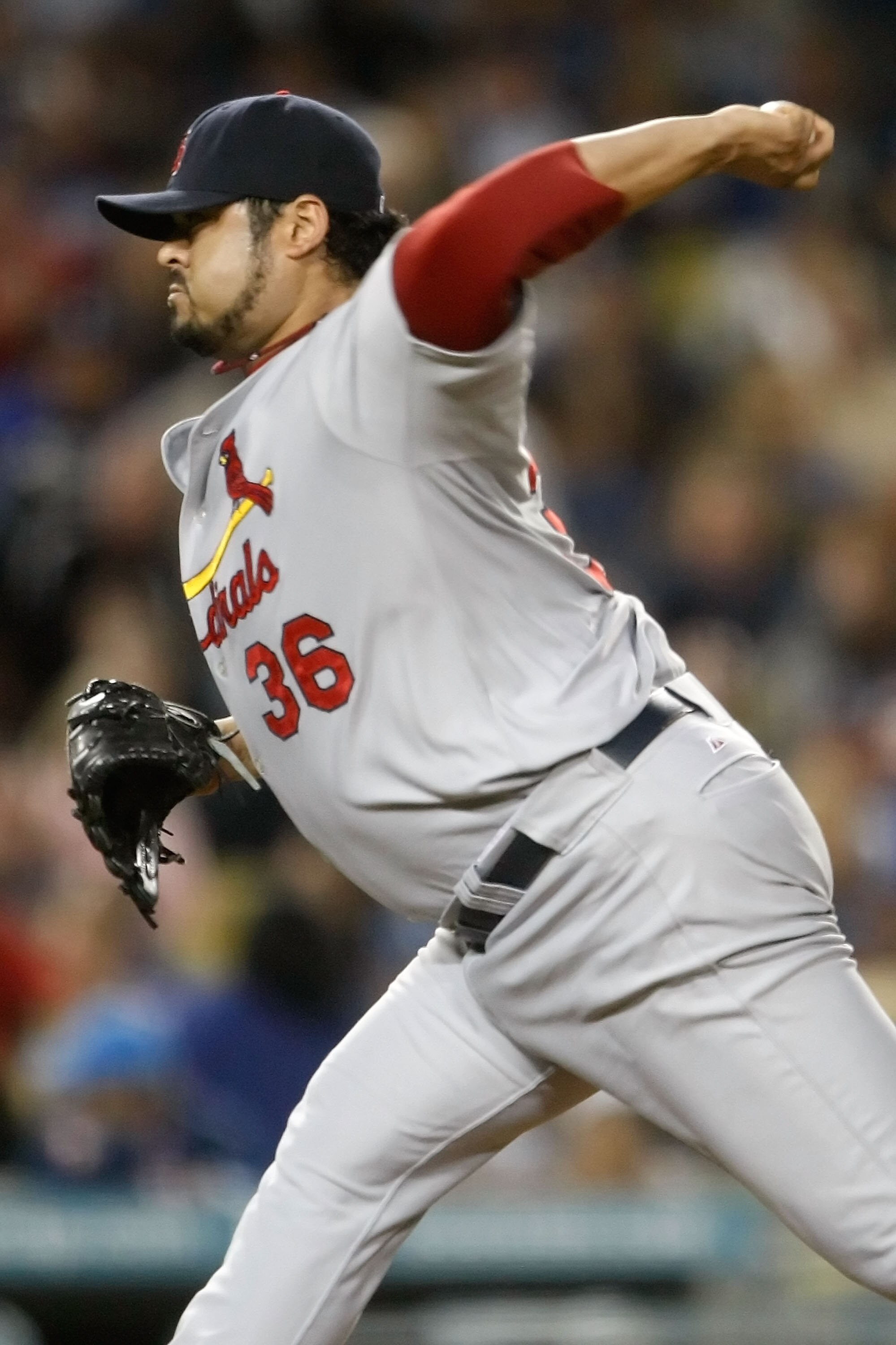 LOS ANGELES, CA - OCTOBER 07:  Dennys Reyes #36 of the St. Louis Cardinals pitches against the Los Angeles Dodgers in Game One of the NLDS during the 2009 MLB Playoffs at Dodger Stadium on October 7, 2009 in Los Angeles, California.  (Photo by Jeff Gross/