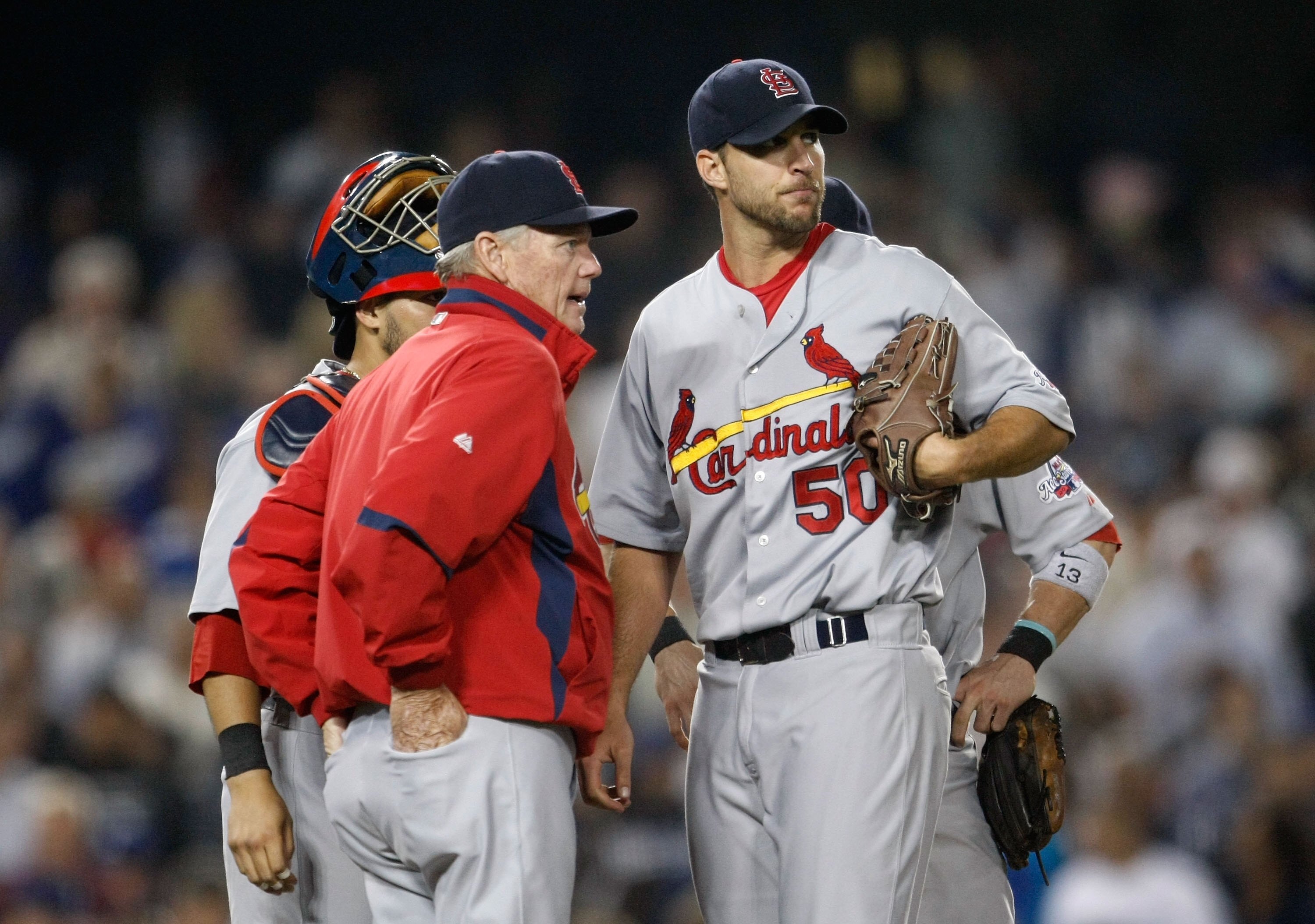 LOS ANGELES, CA - AUGUST 19:  St. Louis Cardinals pitching coach Dave Duncan talks with pitcher Adam Wainwright #50 during the game against the Los Angeles Dodgers at Dodger Stadium on August 19, 2009 in Los Angeles, California.  (Photo by Jeff Gross/Gett