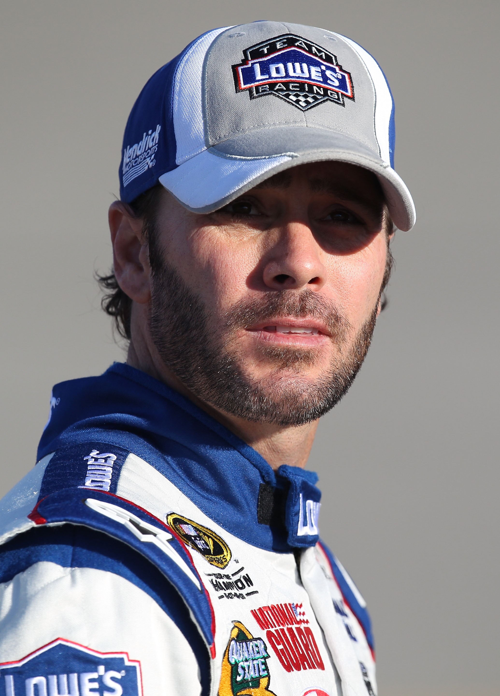 RICHMOND, VA - SEPTEMBER 10:  Jimmie Johnson, driver of the #48 Lowe's Chevrolet,  stands on the grid during qualifying for the NASCAR Sprint Cup Series Air Guard 400 at Richmond International Raceway on September 10, 2010 in Richmond, Virginia.  (Photo b