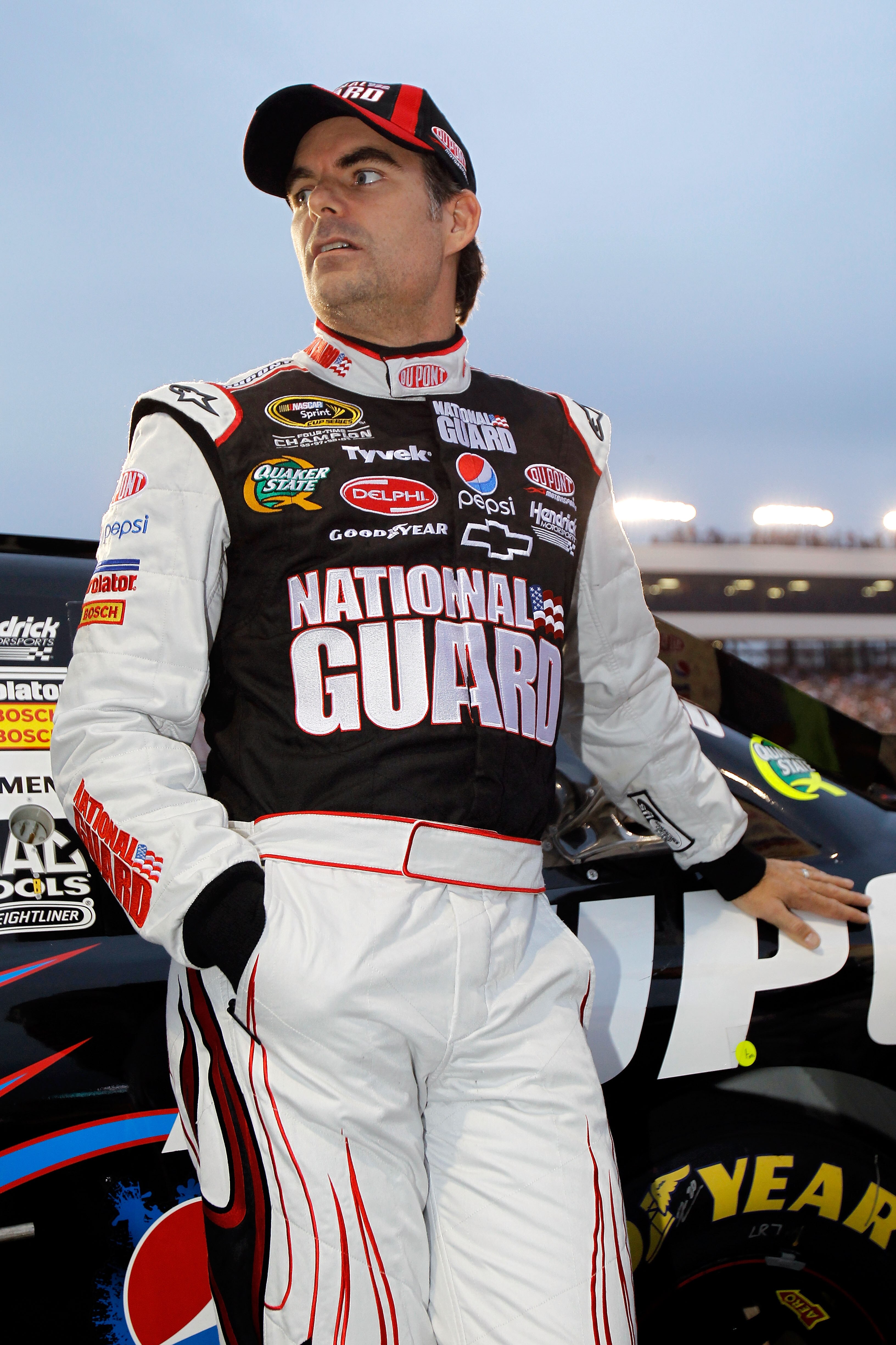 RICHMOND, VA - SEPTEMBER 11:   Jeff Gordon, driver of the #24 DuPont/National Guard Chevrolet, stands next to his car on the grid prior to the NASCAR Sprint Cup Series Air Guard 400 at Richmond International Raceway on September 11, 2010 in Richmond, Virg