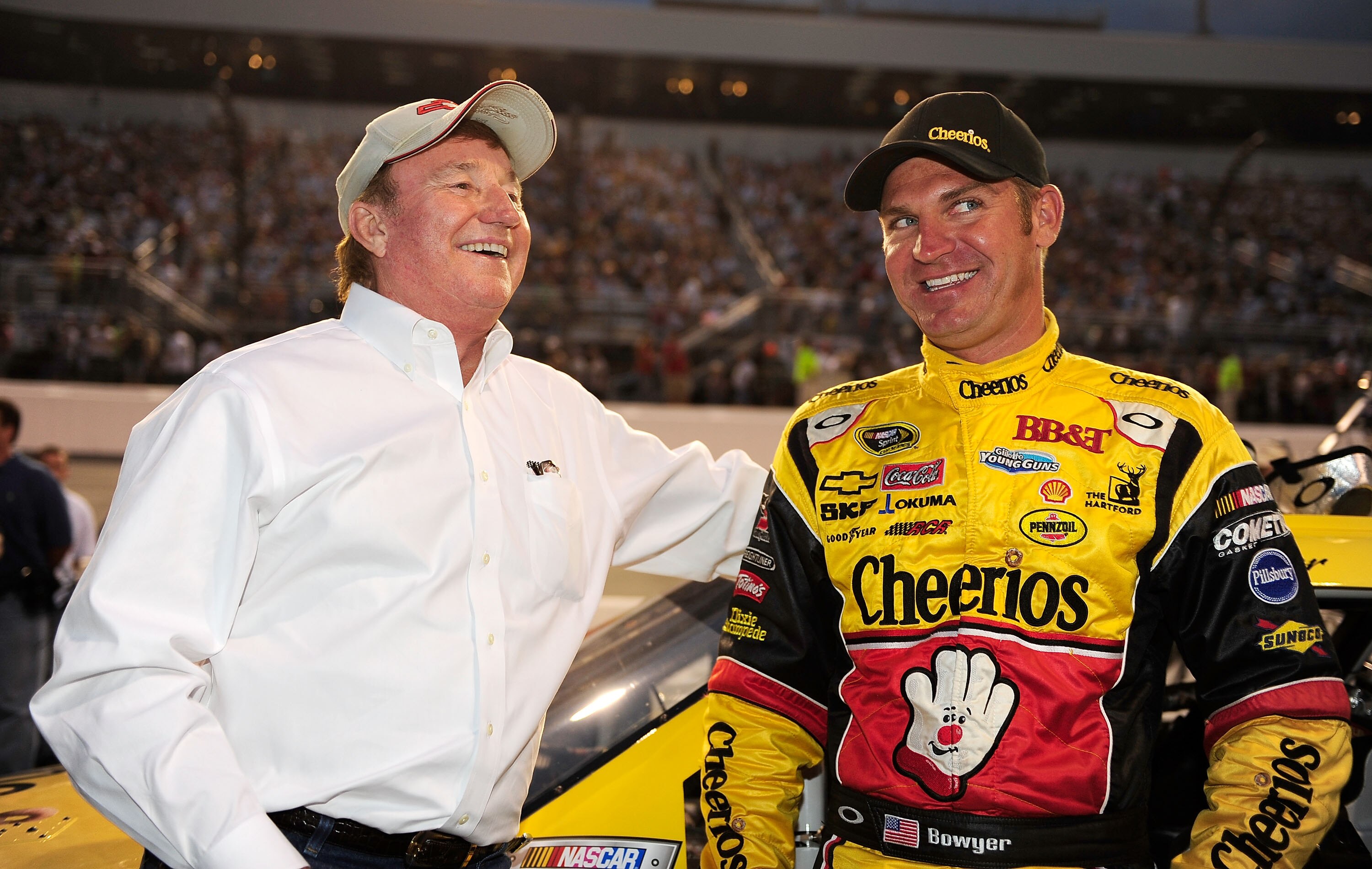 RICHMOND, VA - SEPTEMBER 11: Team owner Richard Childress (L) speaks with Clint Bowyer, driver of the #33 Cheerio's Chevrolet, prior to the start of the NASCAR Sprint Cup Series Air Guard 400 at Richmond International Raceway on September 11, 2010 in Rich