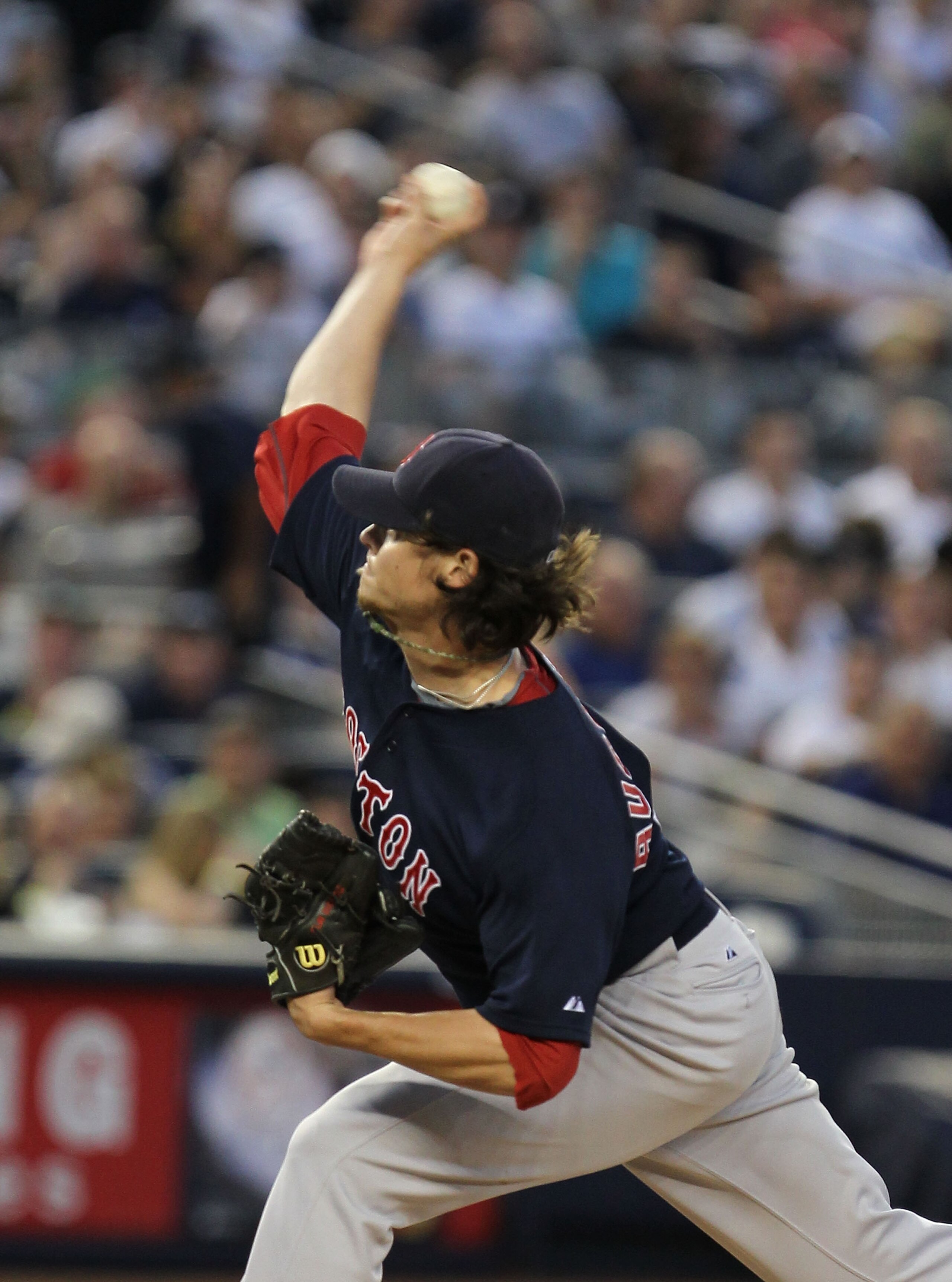 NEW YORK - AUGUST 06:  Clay Buchholz #11 of the Boston Red Sox pitches against the New York Yankees on August 6, 2010 at Yankee Stadium in the Bronx borough of New York City.  (Photo by Al Bello/Getty Images)